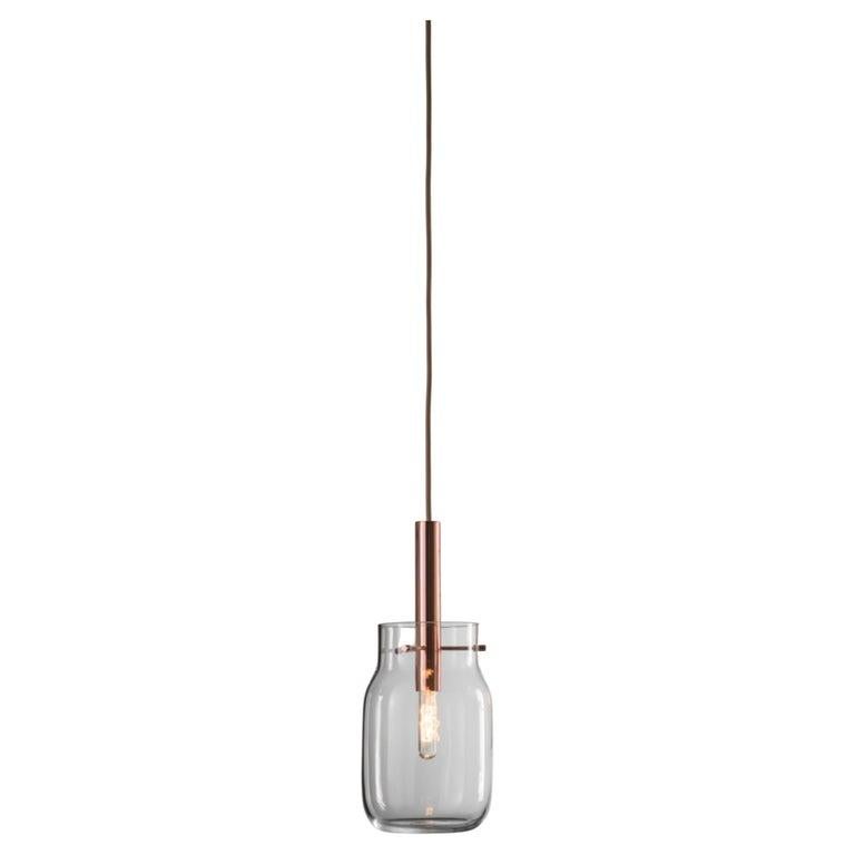 Set of 2 medium Bandaska pendant light by Dechem Studio.
Dimensions: D 15 x H 180 cm
Materials: brass, glass.
Also available: different colours and sizes available.

Hand-blown into beech wood moulds, Bandaska Lights is based on the highly