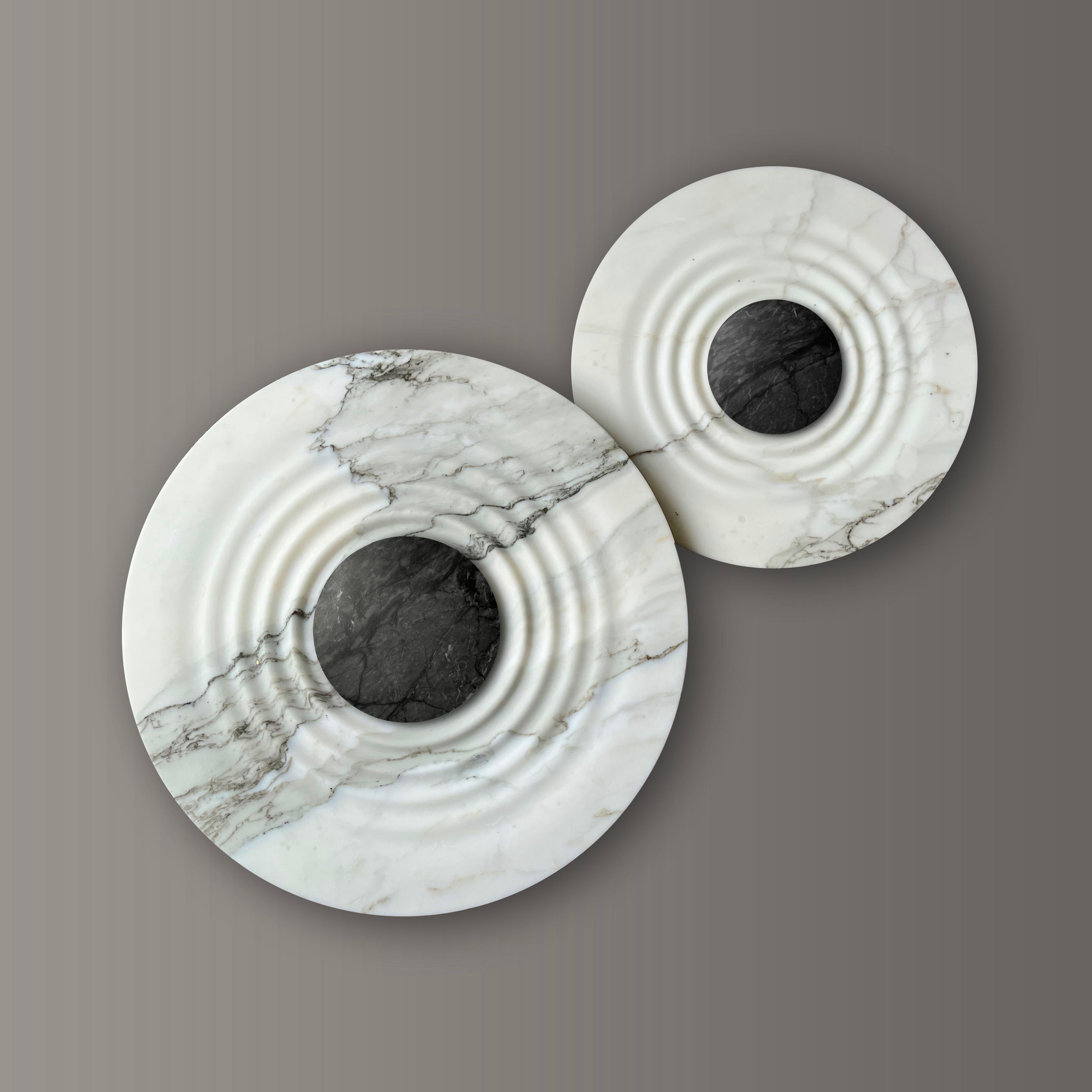 Set Of 2 Messier Marble Sconces by Etamorph
Dimensions: Large: Ø 50 x D 10 cm.
Small: Ø 38 x D 10 cm.
Materials: Calacata Marble and Black Matter stone.

Available in Ø 50 and Ø 38 cm. All our lamps can be wired according to each country. If sold to