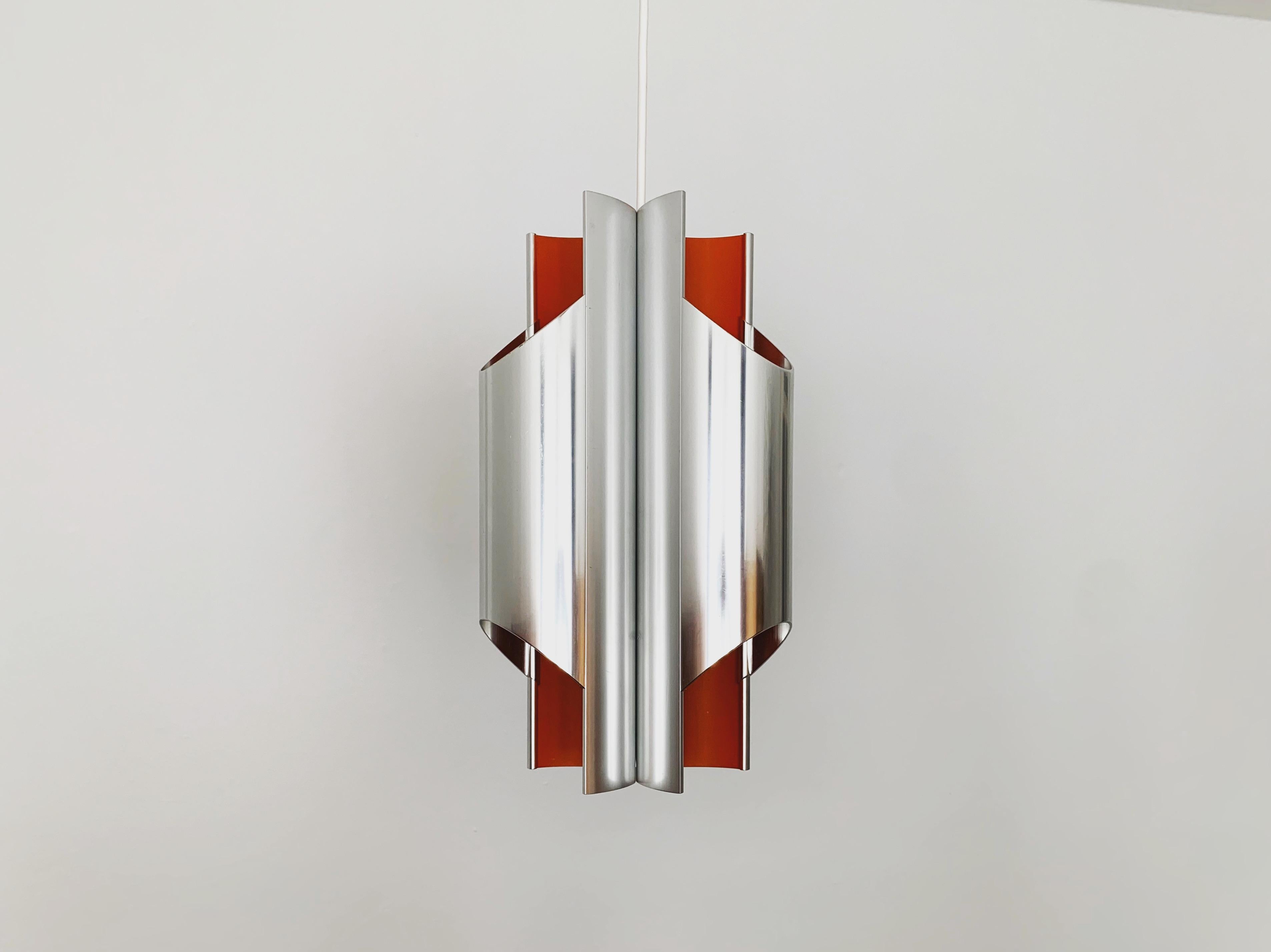 Very beautiful and rare Danish pendant lamps from the 1960s.
The design and the appearance of the lamp is particularly beautiful.
The shape creates a wonderful light.
Exceptionally high-quality workmanship.

Design: Bent Karlby
Manufacturer: