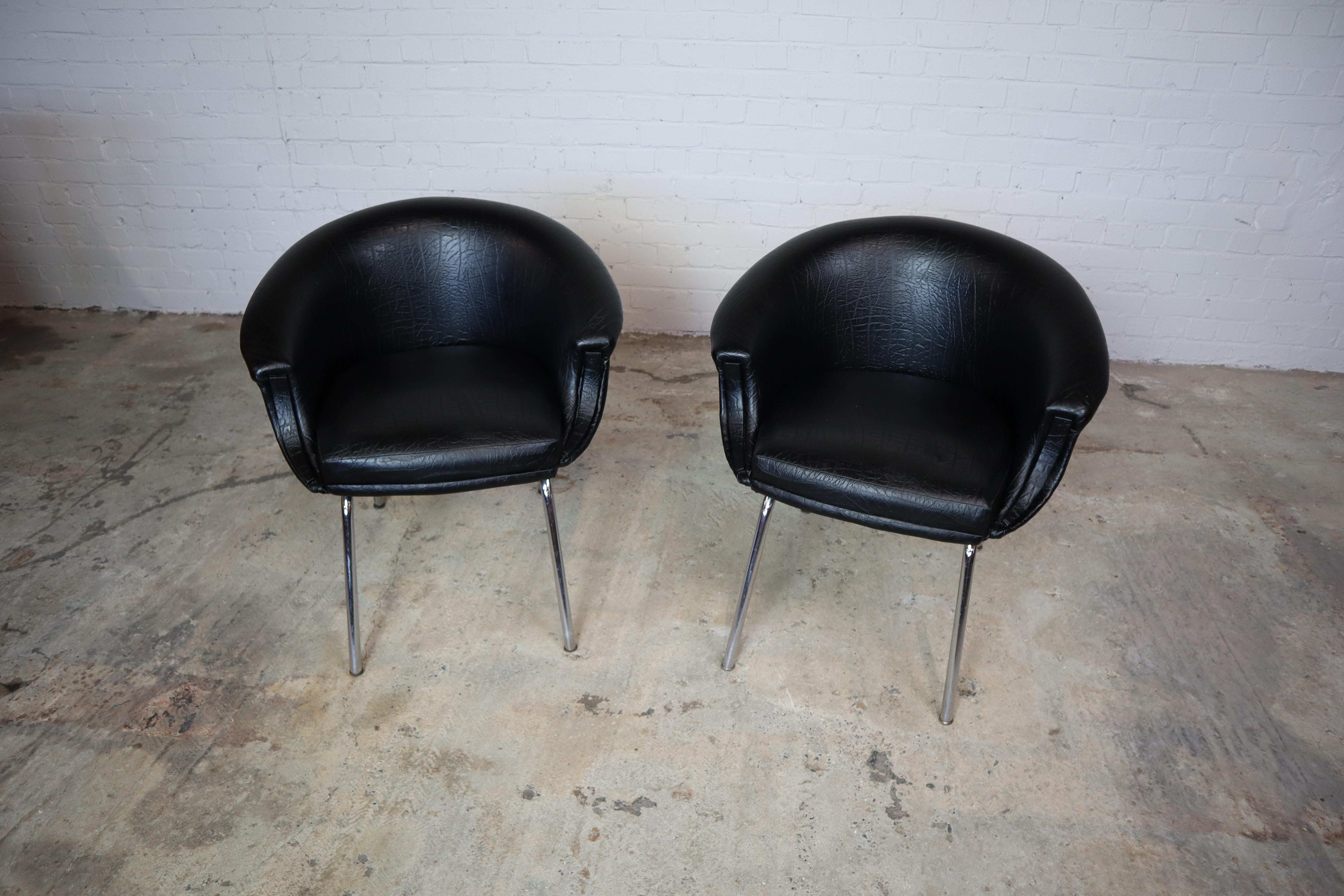 Fantastic pair of black curvy armchairs!