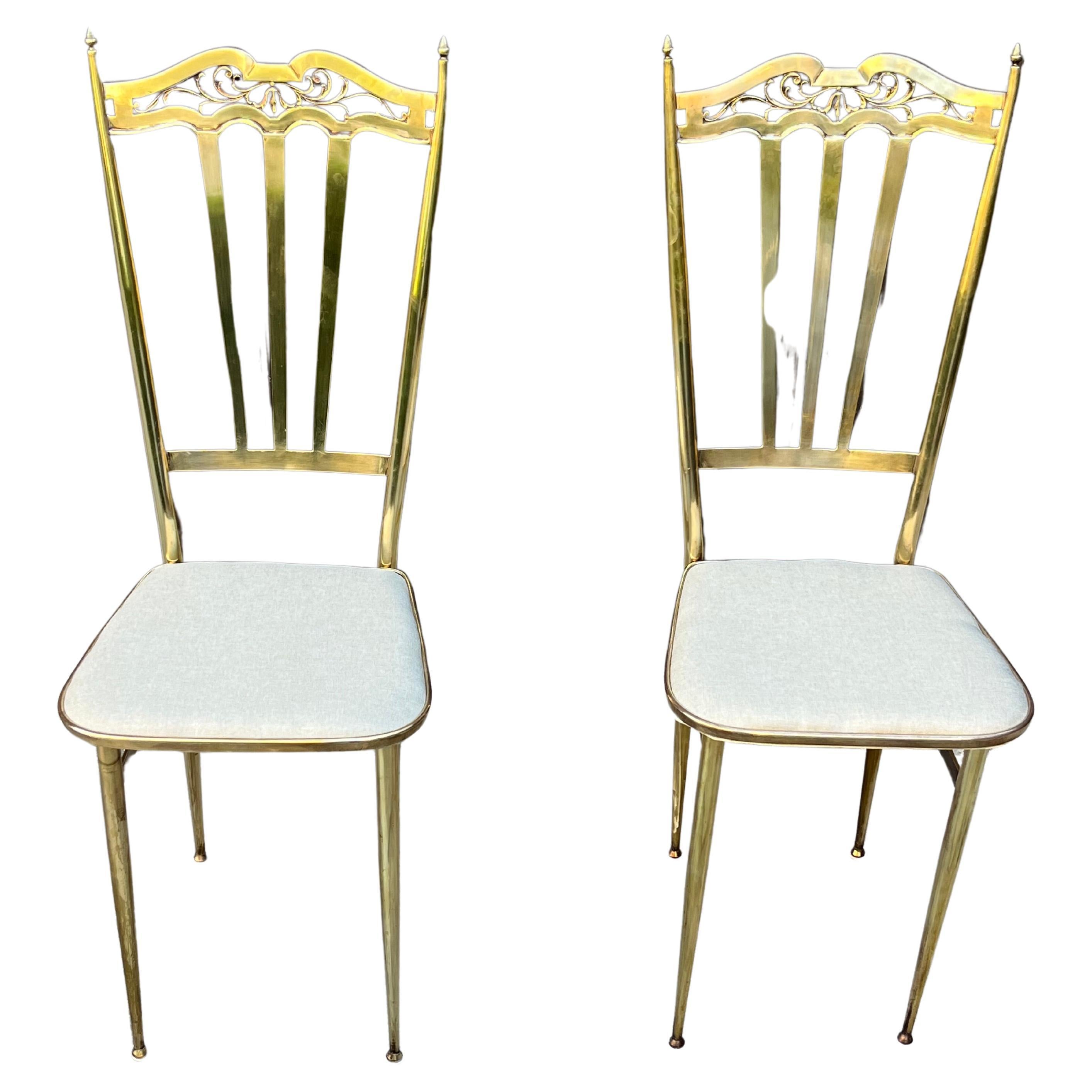 Set of 2 Mid-Century brass chairs, Italian design 1960s
Polished and reupholstered, they are in excellent condition. Found in a noble apartment in my city.

We guarantee adequate packaging and will ship via DHL, insuring the contents against any