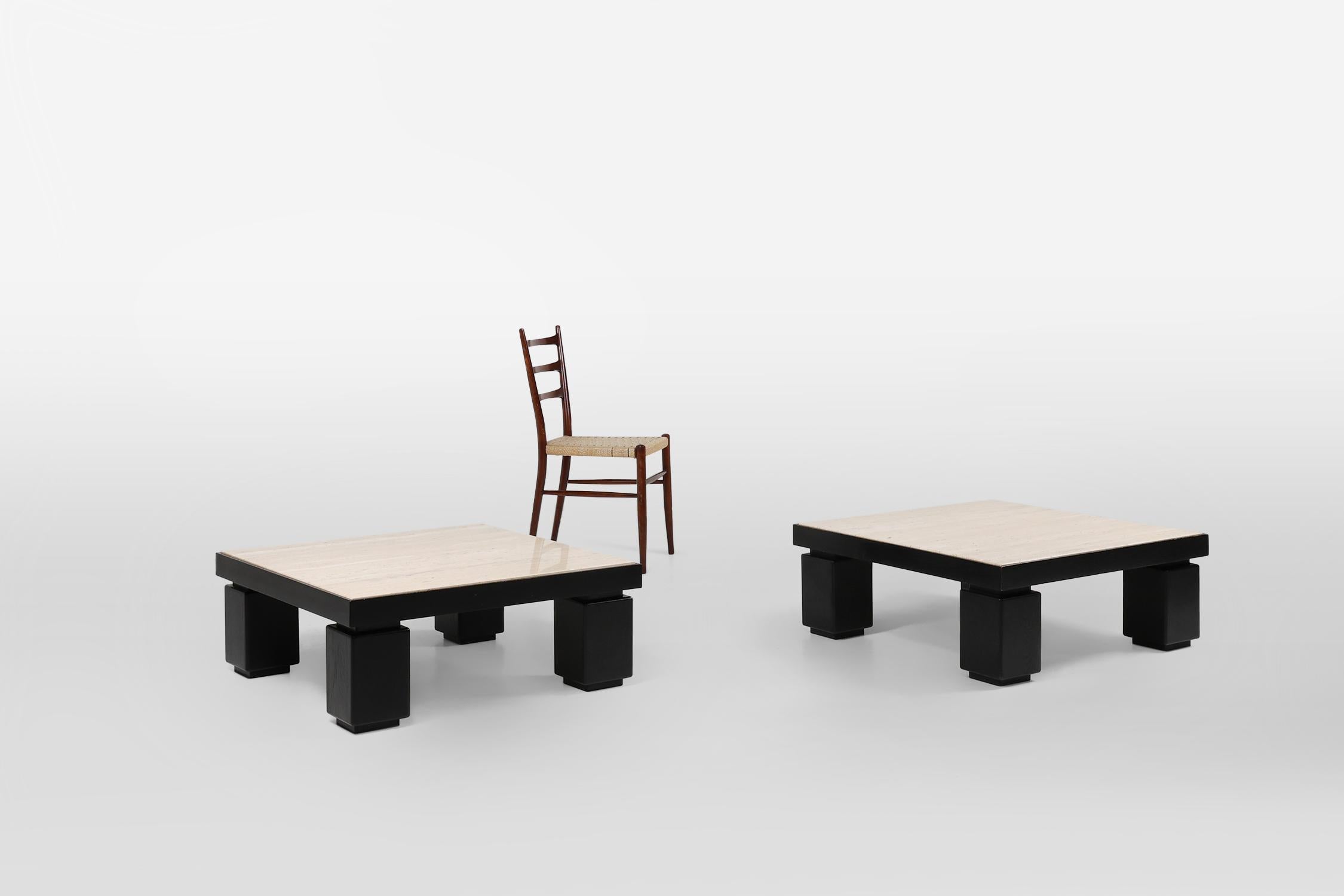 Belgium / 1980 / 2 coffee tables / oak, wood, travertine / Mid-century / Vintage

Beautiful set of two minimalistic coffee tables, designed in Belgium in the 1980s. These tables have a travertine top and both rest on four thick blackened wooden legs