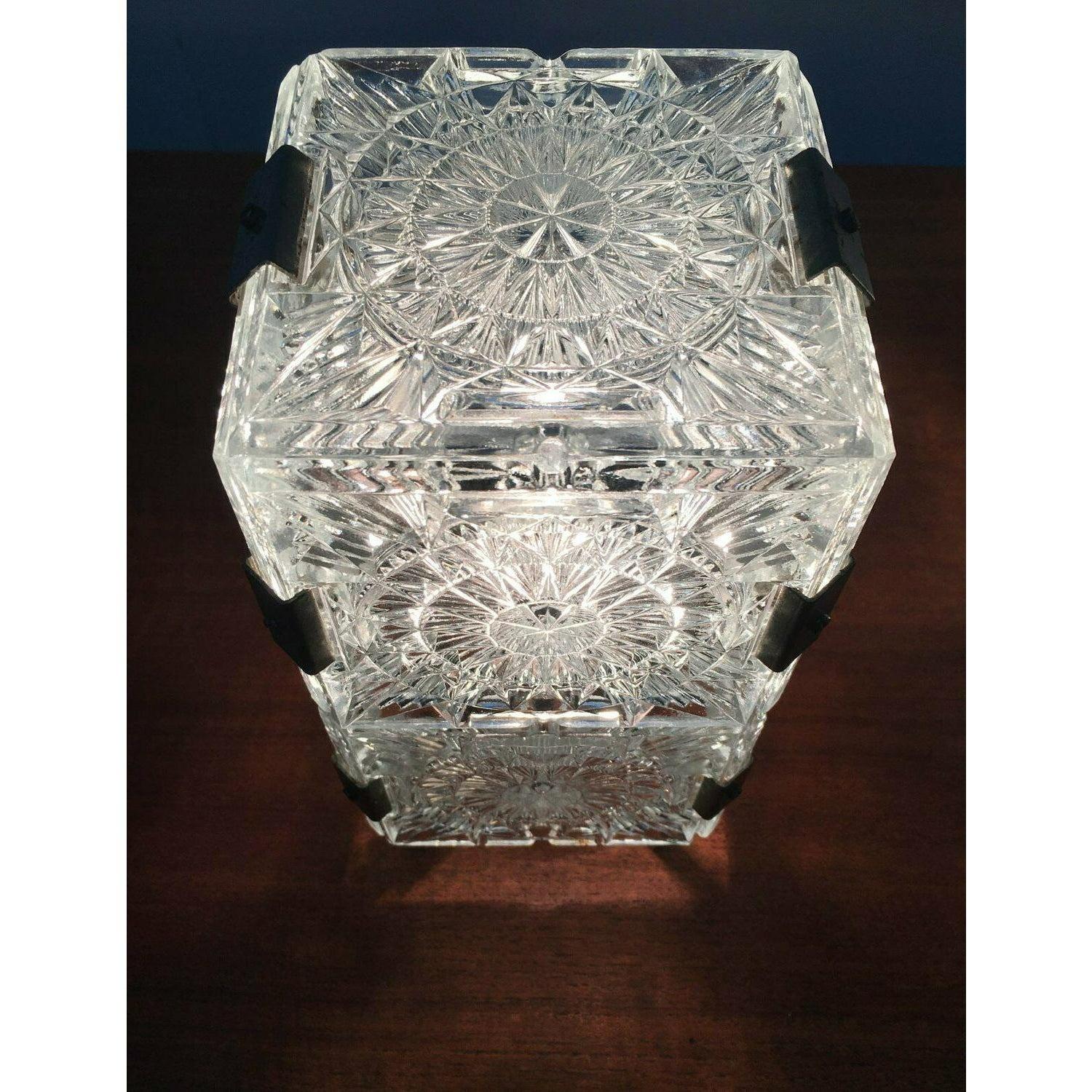 Rare mid-century table lamps from the Czech manufacturer Lustry Kamenický Šenov from Soviet times.

A simple design with an impressive effect. The cubic design language harmonizes with the rich ornamentation of the glasses. What is special here is