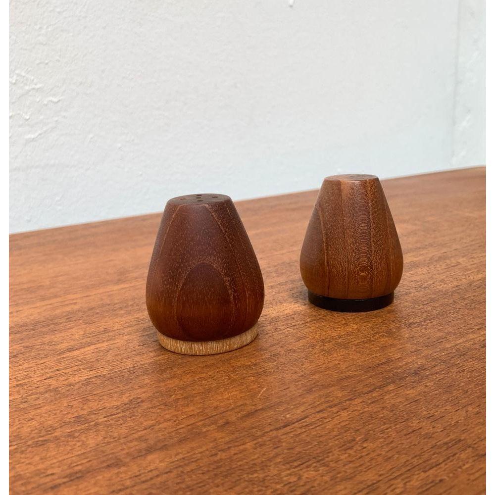Mid-Century Danish Teak Pepper and Salt Shaker, 1960s, Set of 2, in Very Good conditions. Designed 1960 to 1969.

Additional information:
Materials: Teak
Styles: Mid-Century Modern
Color: Beige
Country of Origin: Denmark
Item Type: Vintage, Antique
