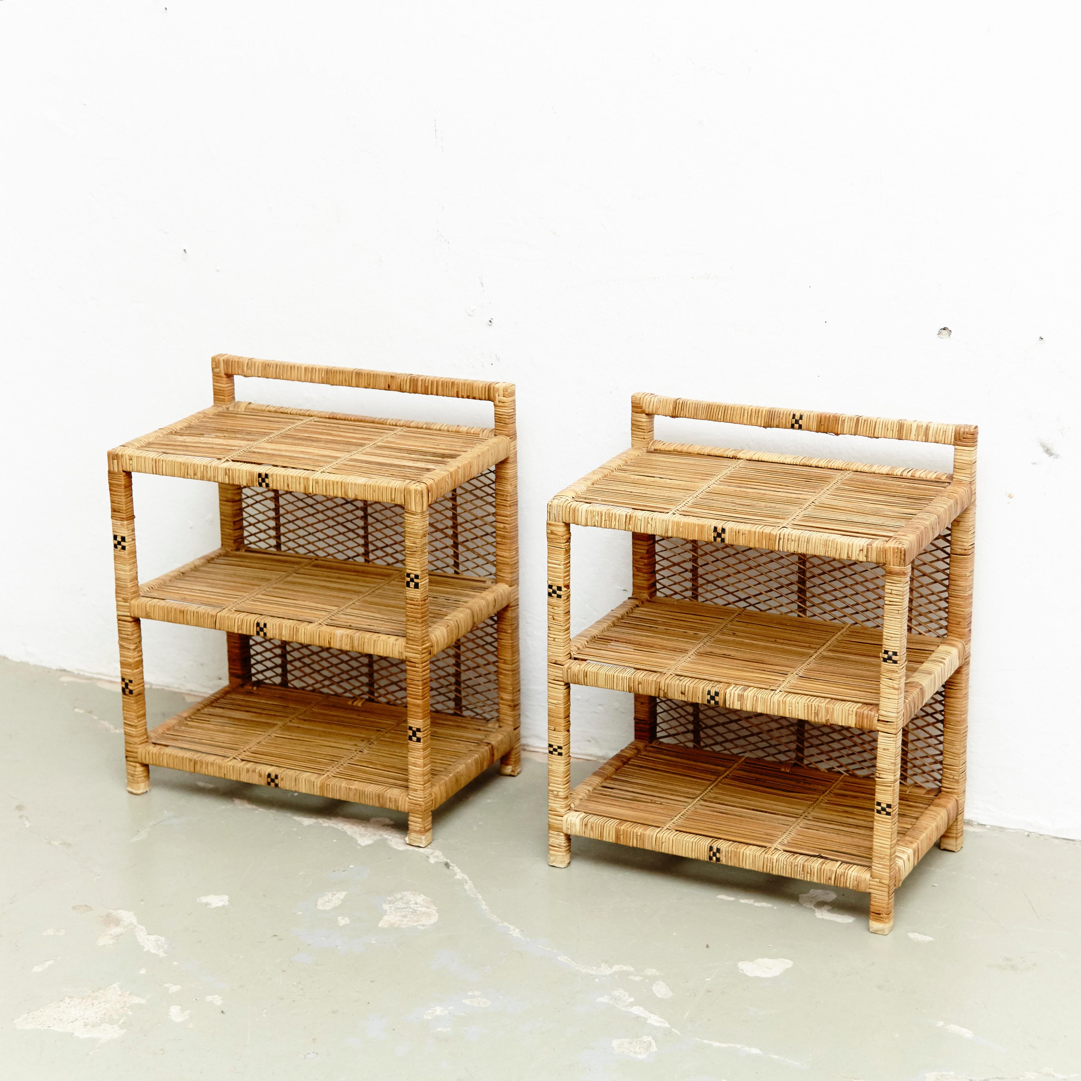 Set of 2 Mid-Century Modern rattan side tables, circa 1960
Traditionally, manufactured in Spain.
By unknown designer.

In original condition with minor wear consistent of age and use, preserving a beautiful patina.

Beautiful rationalist