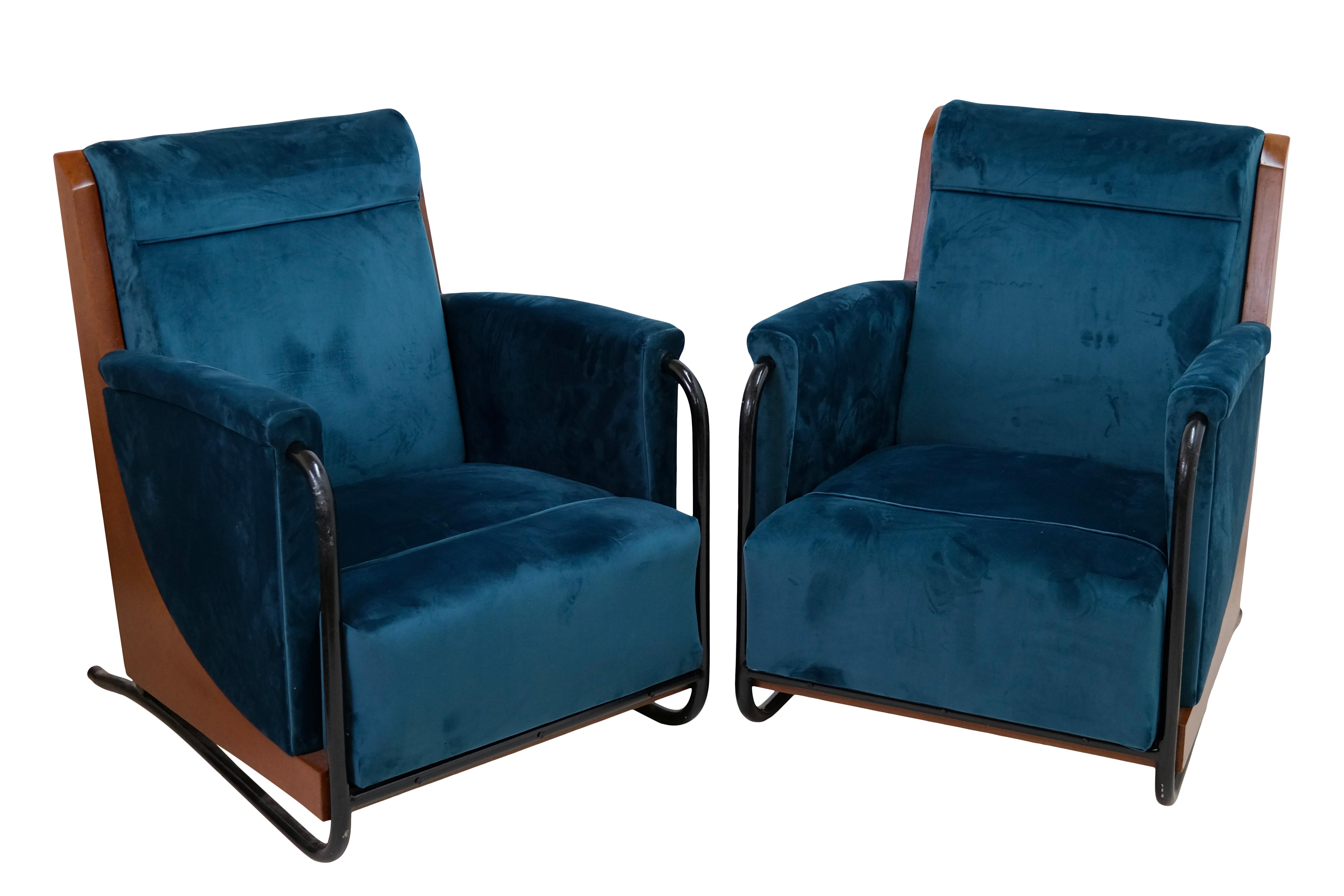 Pair of armchairs
Black steel tubes
Mahogany stained backrest
Petrol coloured velour

Midcentury, 1950s

Dimensions:
Width: 73 cm
Height: 88 cm
Depth: 83 cm
Seat height: 40 cm