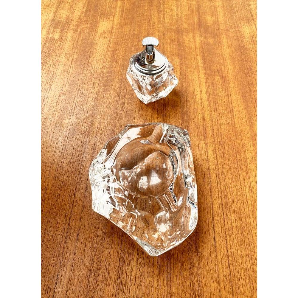 Mid-Century Scandinavian Heavy Ice Glass Table Lighter and Ashtray, 1960s, Set of 2, in Very Good conditions. Designed 1960 to 1969.

Additional information:
Materials: Glass, Metal
Color: Silver
Styles: Mid-Century Modern
Item Type: Vintage,