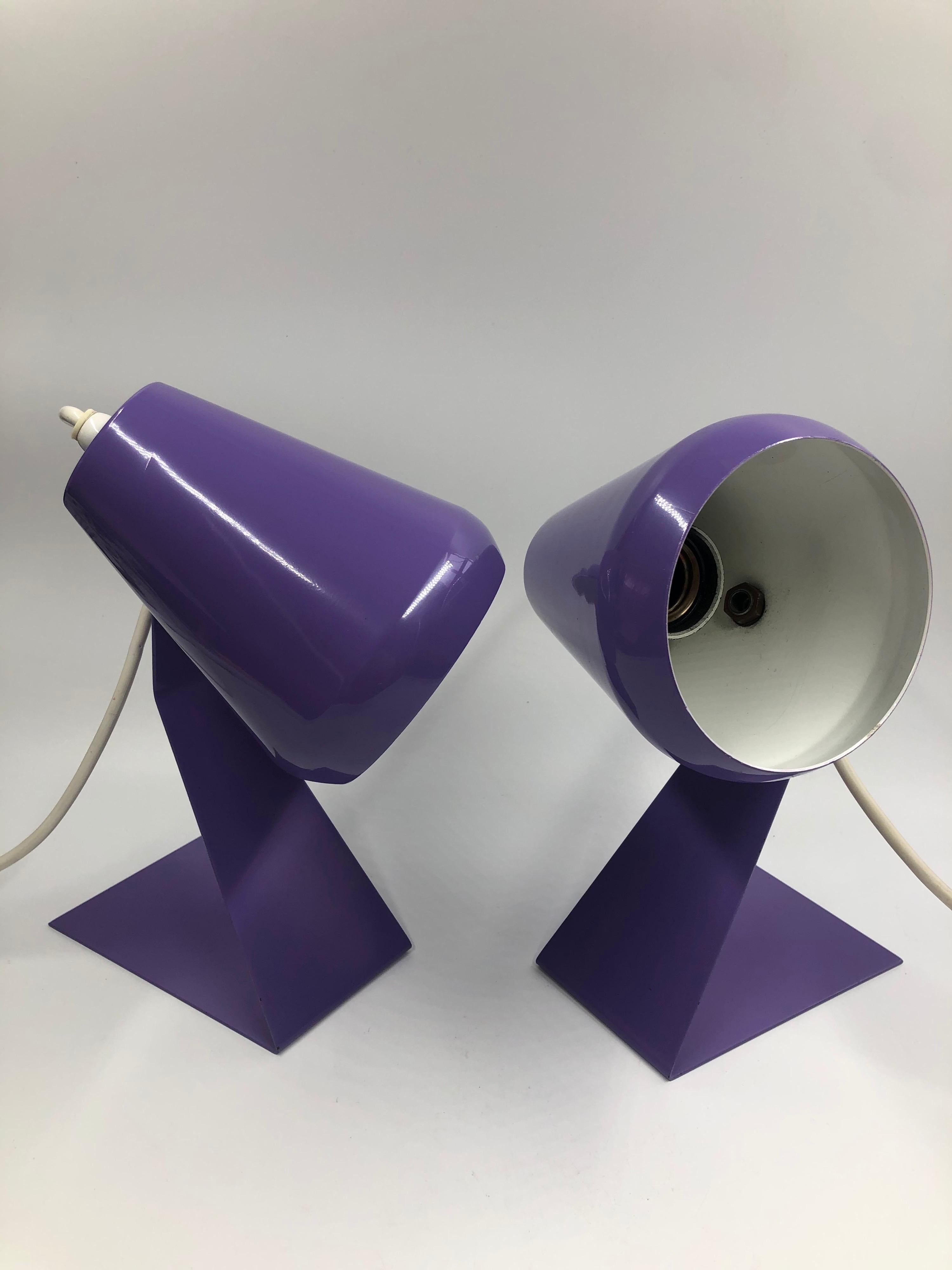 Set of 2 extremely rare Mid-Century Modern table lamps / bedside table lamps. Designed and manufactured in 1960s, the Netherlands. The lamp shades are adjustable. 

These bedside table lamps are executed in enameled purple and in very good