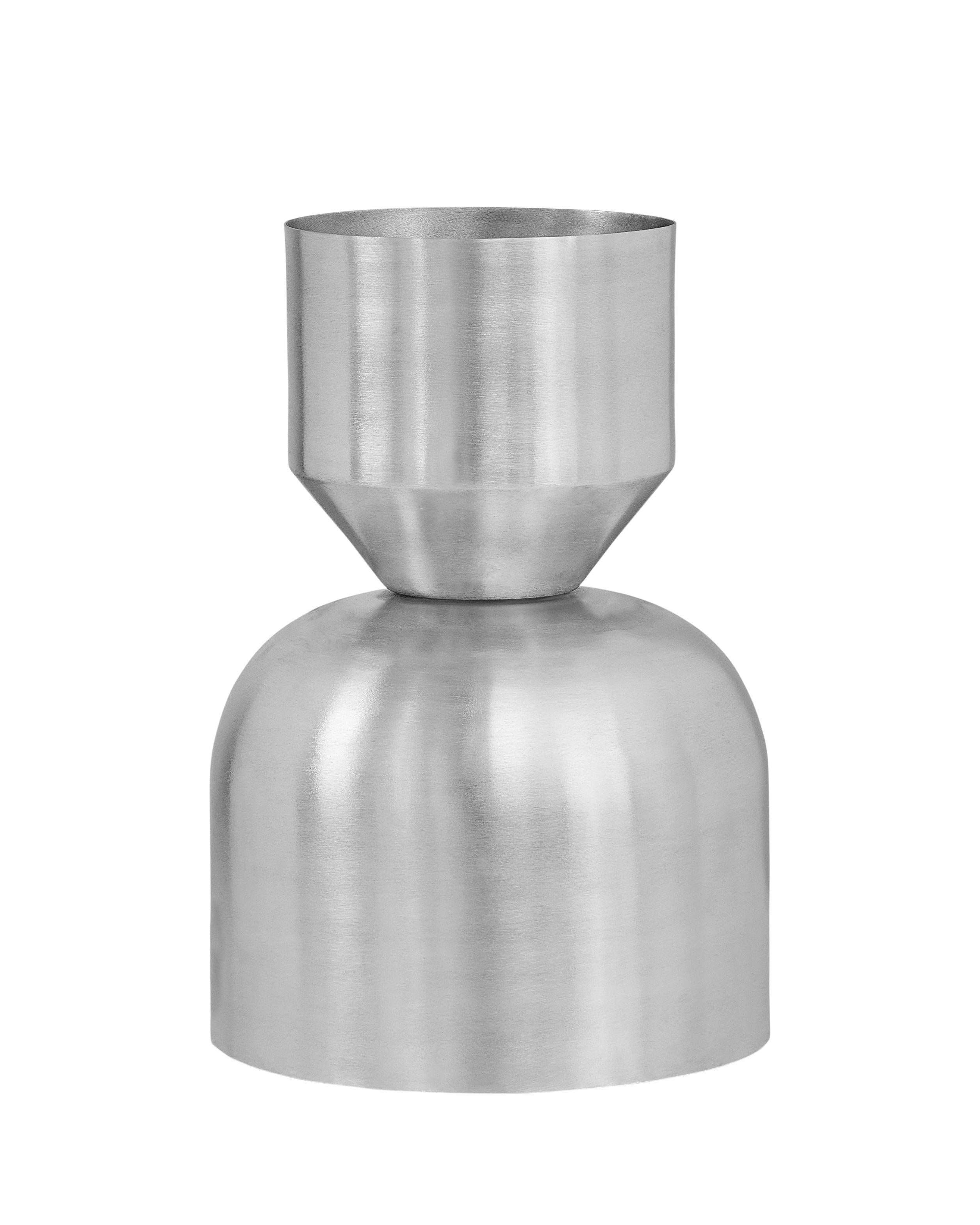 Set of 2 Midi Ada Planters by Llot Llov
Dimensions: Ø230mm x 370mm
Materials: brushed raw aluminium
Also available in black powder-coated. 

Ada Planter was made from aluminium in a metal spinning process. It is meant to be the new home for plants