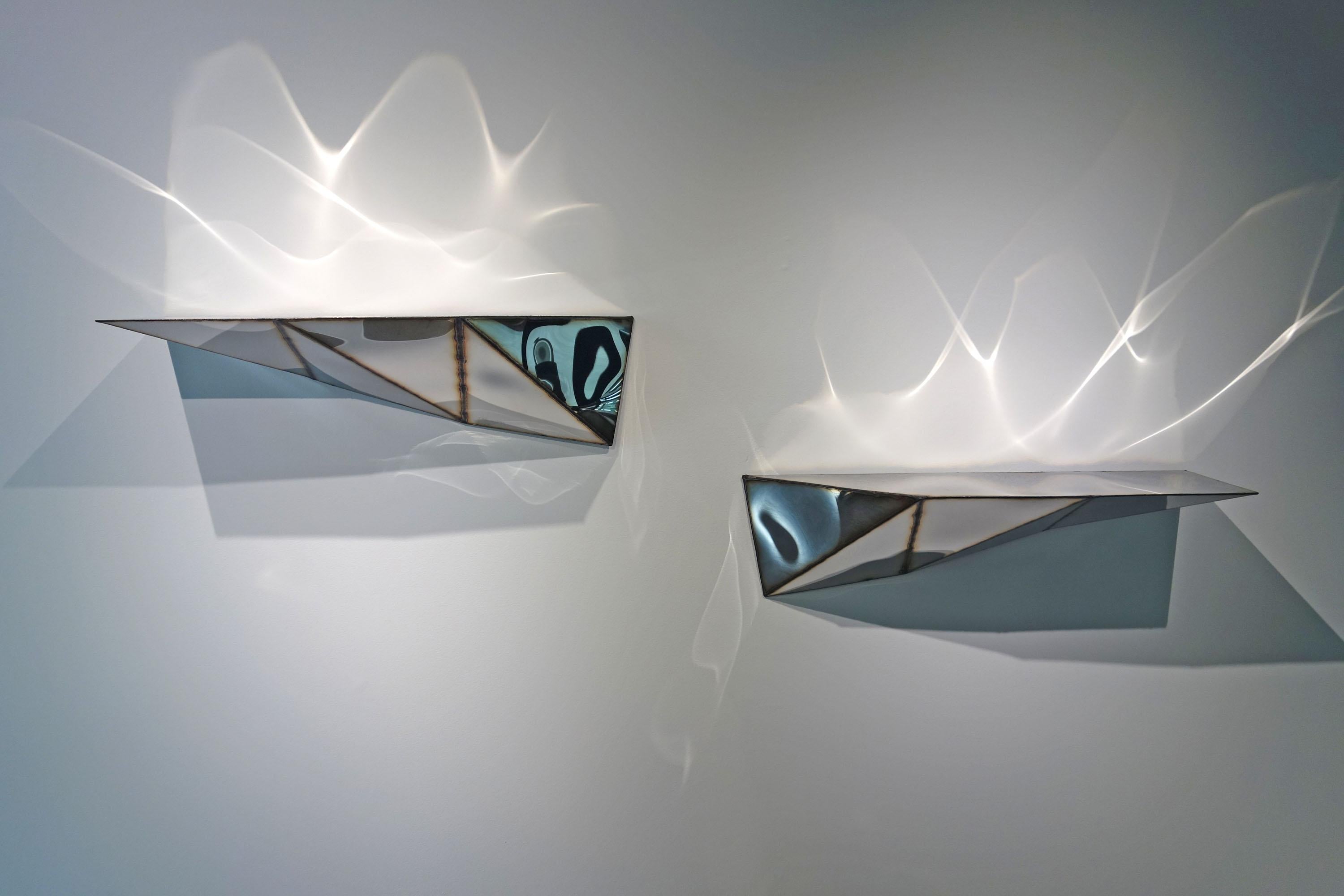 Set Of 2 Mirror Image Shelves in Mirror-Polished Stainless Steel by Julian Mayor
Limited Edition of 8 + 4AP.
Dimensions: D 24 x W 85 x H 24 cm. 
Materials: Mirror-polished stainless steel.

Julian Mayor is a British artist and designer renowned for