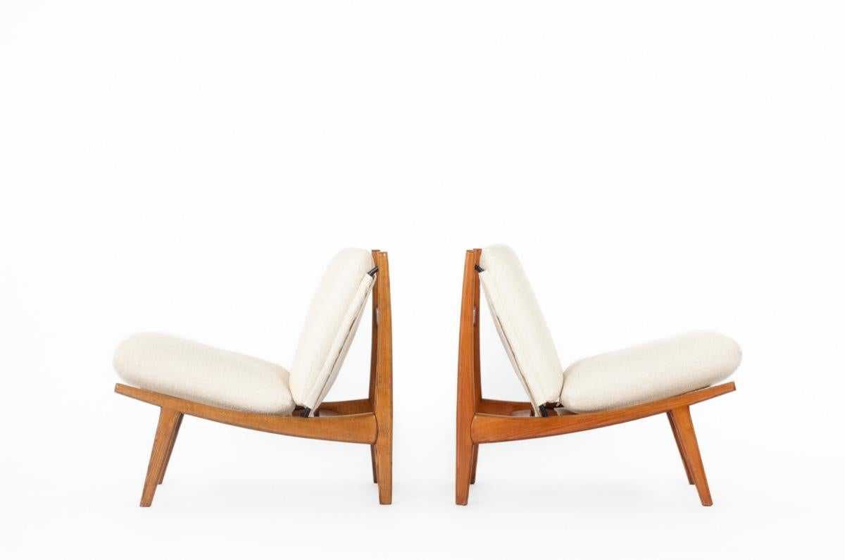 Set of 2 low chairs from Joseph Andre Motte for Steiner
Model 790
Structure in ash, cushions in foam covered by a beige terry fabric (new)
Nice patina of time
A small difference in wood color between the two structure