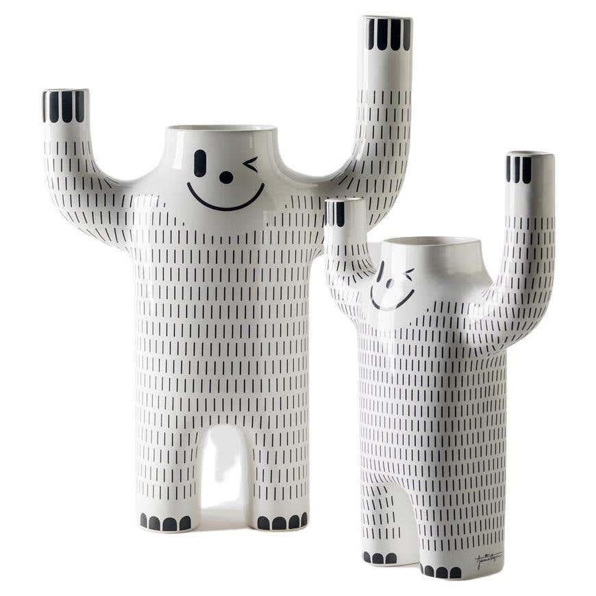 Set of 2 Modern Decor White Happy Yeti Ceramic Flower Vase

Materials: 
Porcelain

Dimensions: 
Large: D 14 cm x W 33 cm x H 47 cm
Small: D 10 cm x W 24 cm x H 34 cm

