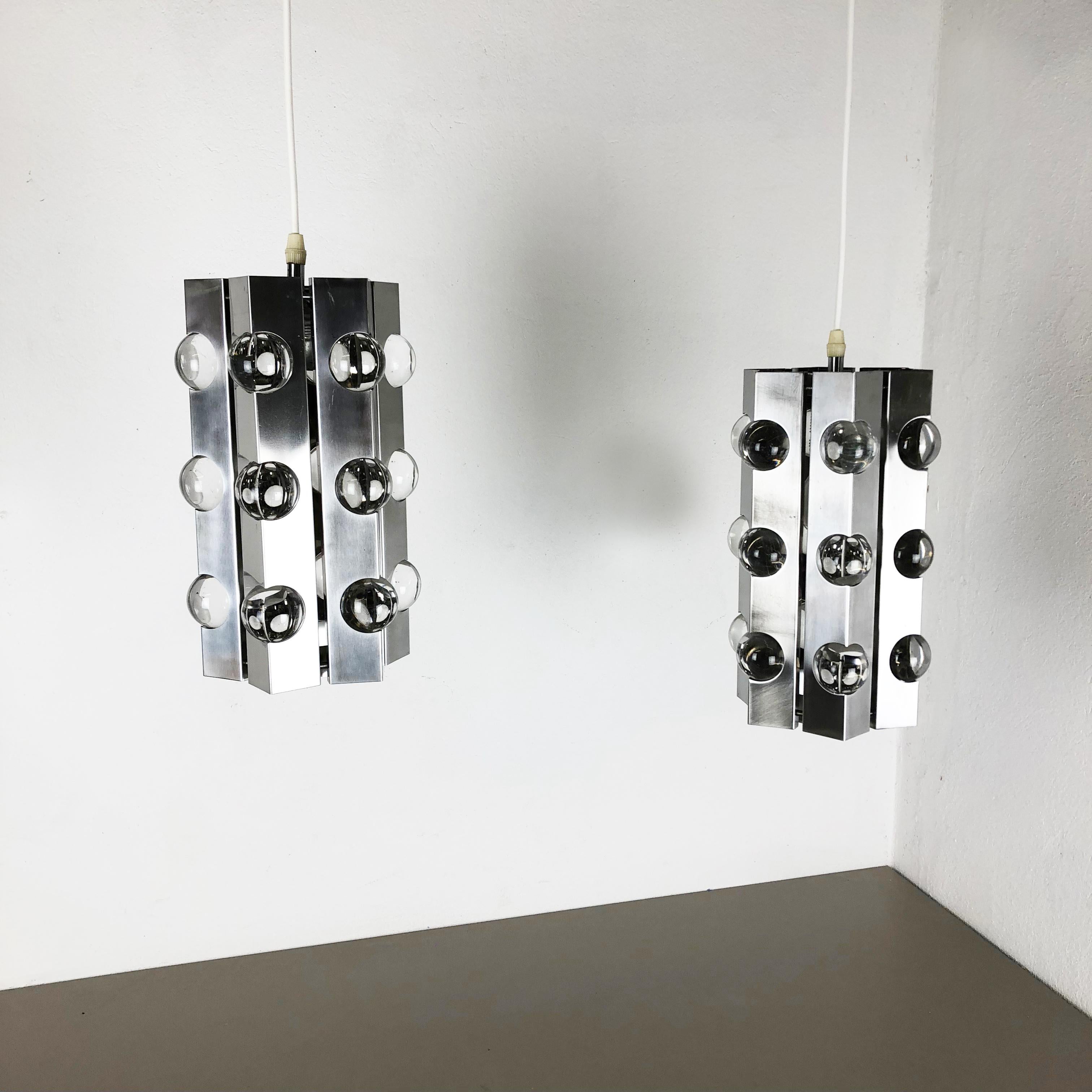 Article:

Sputnik hanging light set of 2


Producer:

Cosack Lights, Germany


Origin:

Germany



Age:

1970s



This 1970s hanging light was designed and produced by Cosack Lights in Germany. This set is a characteristically