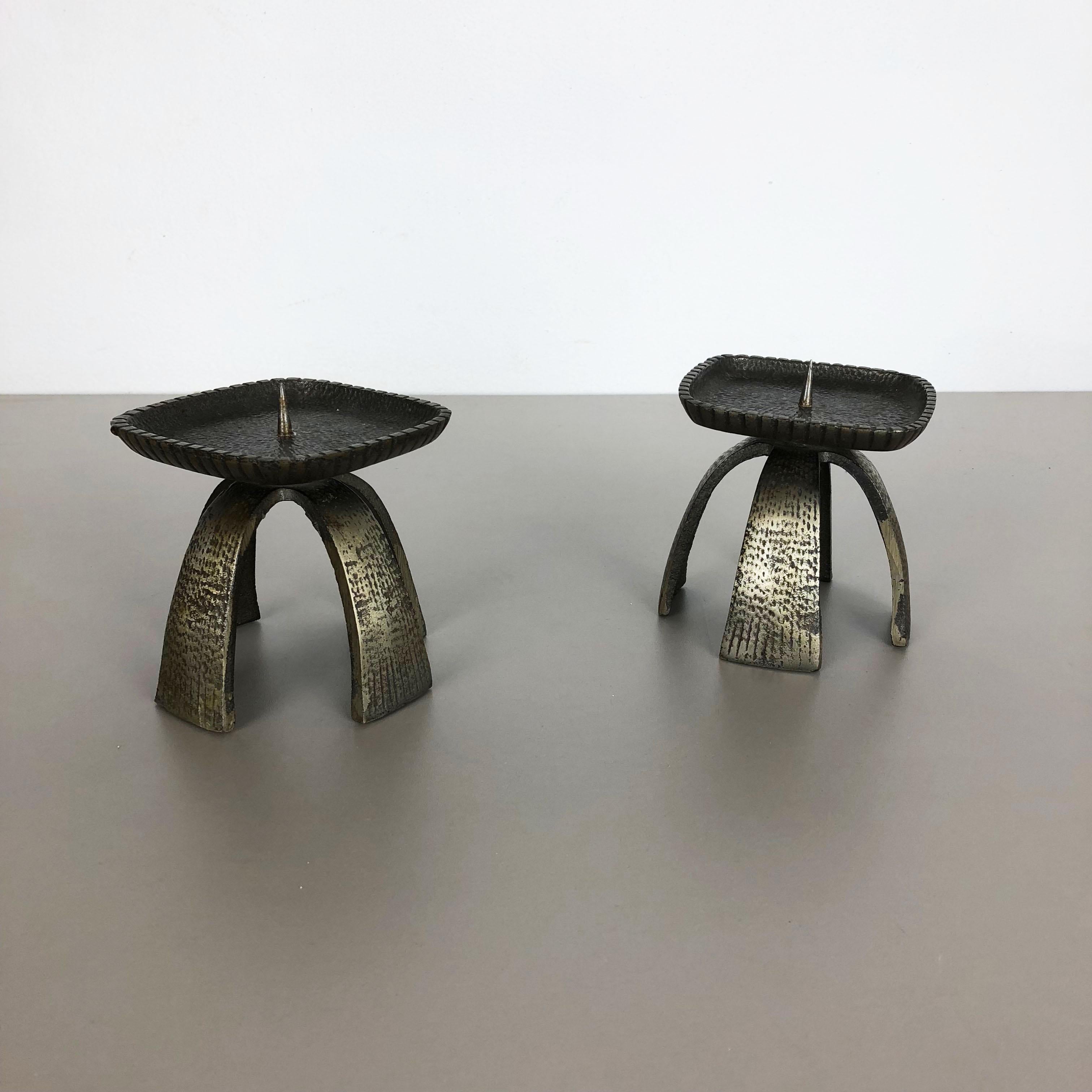 Article:

Brutalist candleholder set of 2


Origin:

France


Material:

Metal iron


Decade:

1970s


Description:

This original vintage candleholder, was produced in the 1970s in France. It is made of solid heavy cast metal, and has a lovely