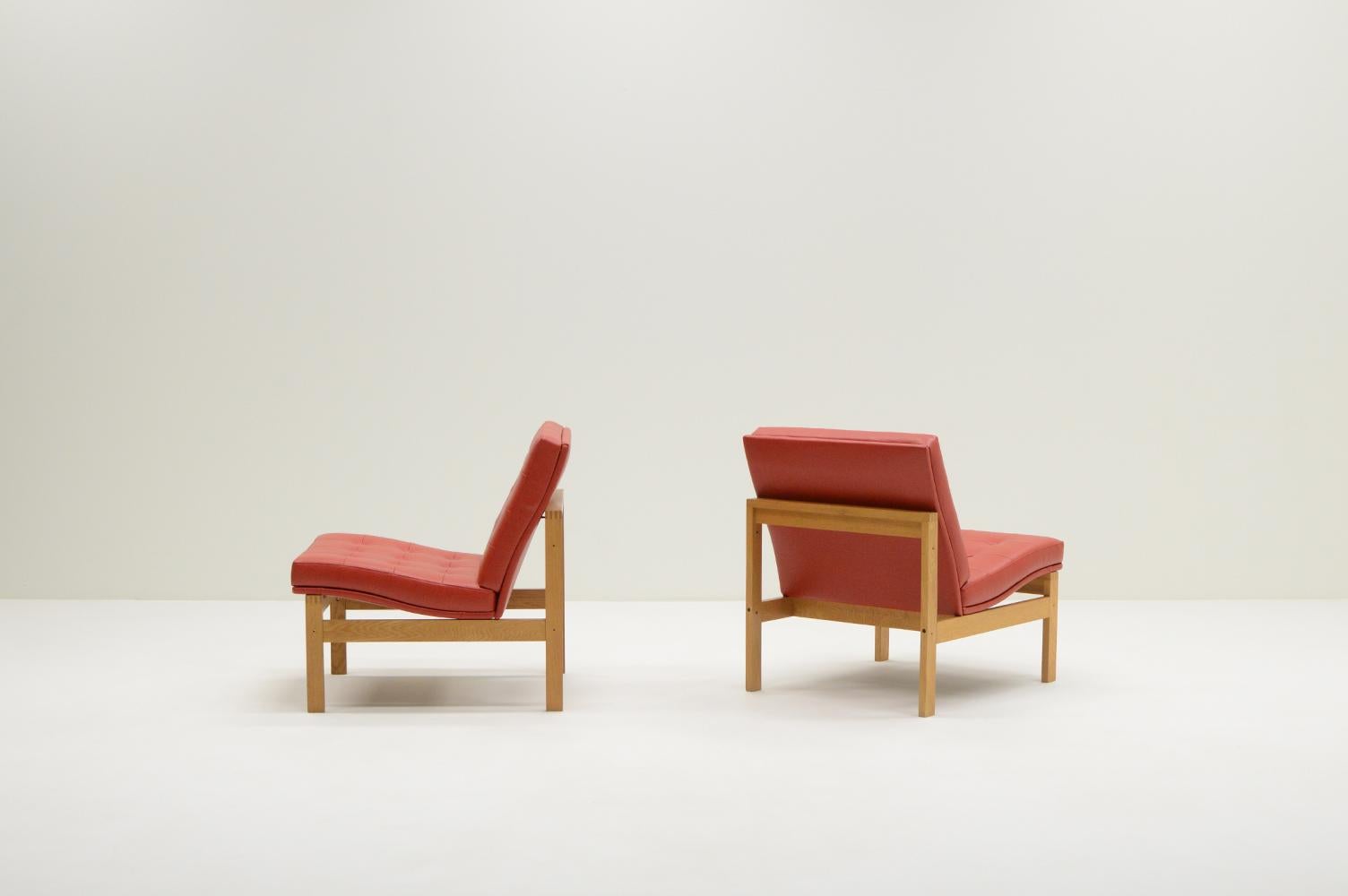 Set of 2 Moduline chairs by Ole Gjerløv Knudsen and Torben Lind for Cado, 1960s Denmark. The “Moduline” series was like the name suggests a modular system. You could connect these chairs to make a sofa, add tables and make a whole living room set.