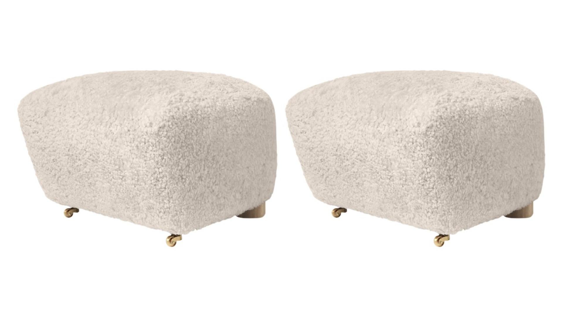Set of 2 moonlight natural oak sheepskin the tired man footstools by Lassen
Dimensions: W 55 x D 53 x H 36 cm 
Materials: Sheepskin

Flemming Lassen designed the overstuffed easy chair, The Tired Man, for The Copenhagen Cabinetmakers’ Guild