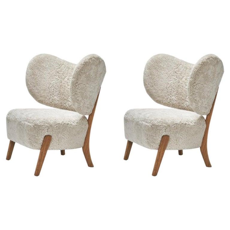 Set of 2 Moonlight Sheepskin TMBO Lounge Chairs by Mazo Design
Dimensions: W 90 x D 68.5 x H 87 cm
Materials: Oak, Sheepskin.
Also Available: ROMO/Linara, DAW/Royal, KVADRAT/Remix, KVADRAT/Hallingdal & Fiord, BUTE/Storr, DEDAR/Linear,
DAW/Mohair