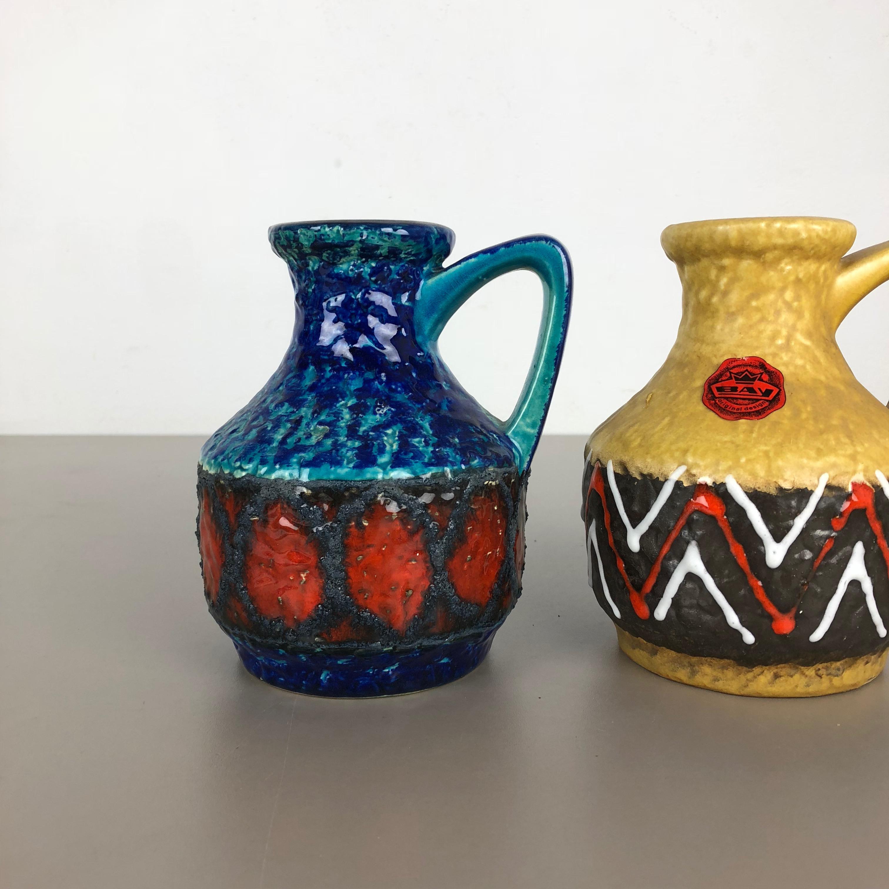 Article:

Pottery ceramic vase set of 2


Producer:

BAY Ceramic, Germany


Decade:

1960s



Description:

Set of 2 original vintage 1960s pottery ceramic vase made in Germany. High quality German production with a nice abstract