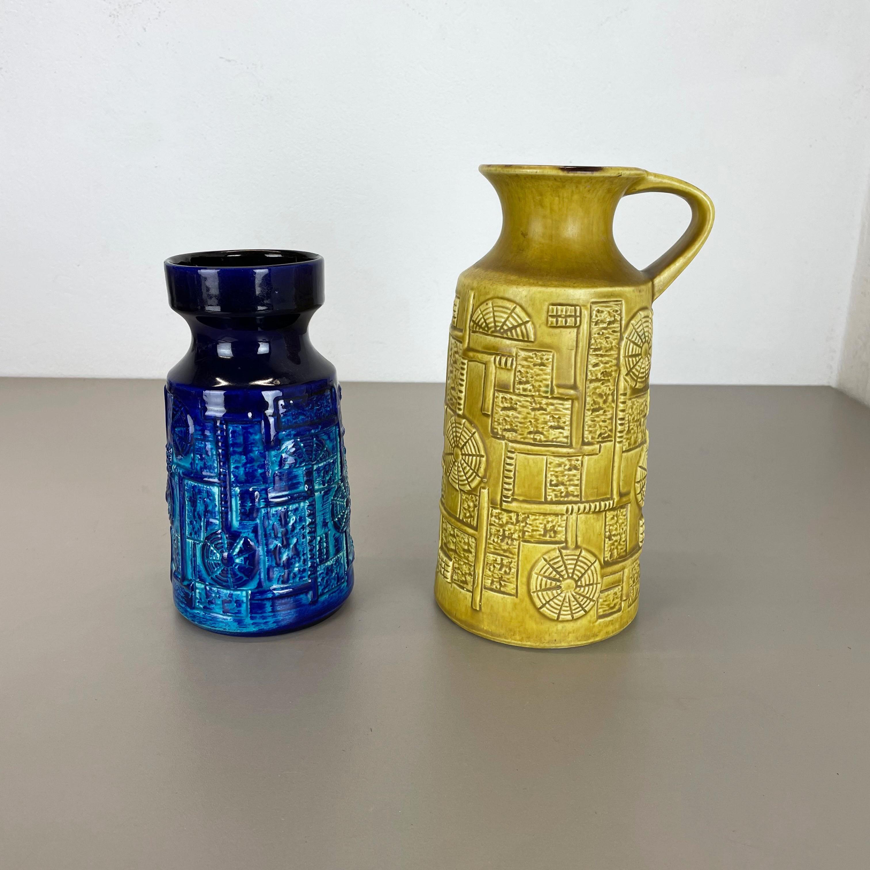 Article:

Pottery ceramic vase set of 2


Producer:

BAY Ceramic, Germany


Decade:

1970s



Description:

Set of 2 original vintage 1970s pottery ceramic vase made in Germany. High quality German production with a nice abstract