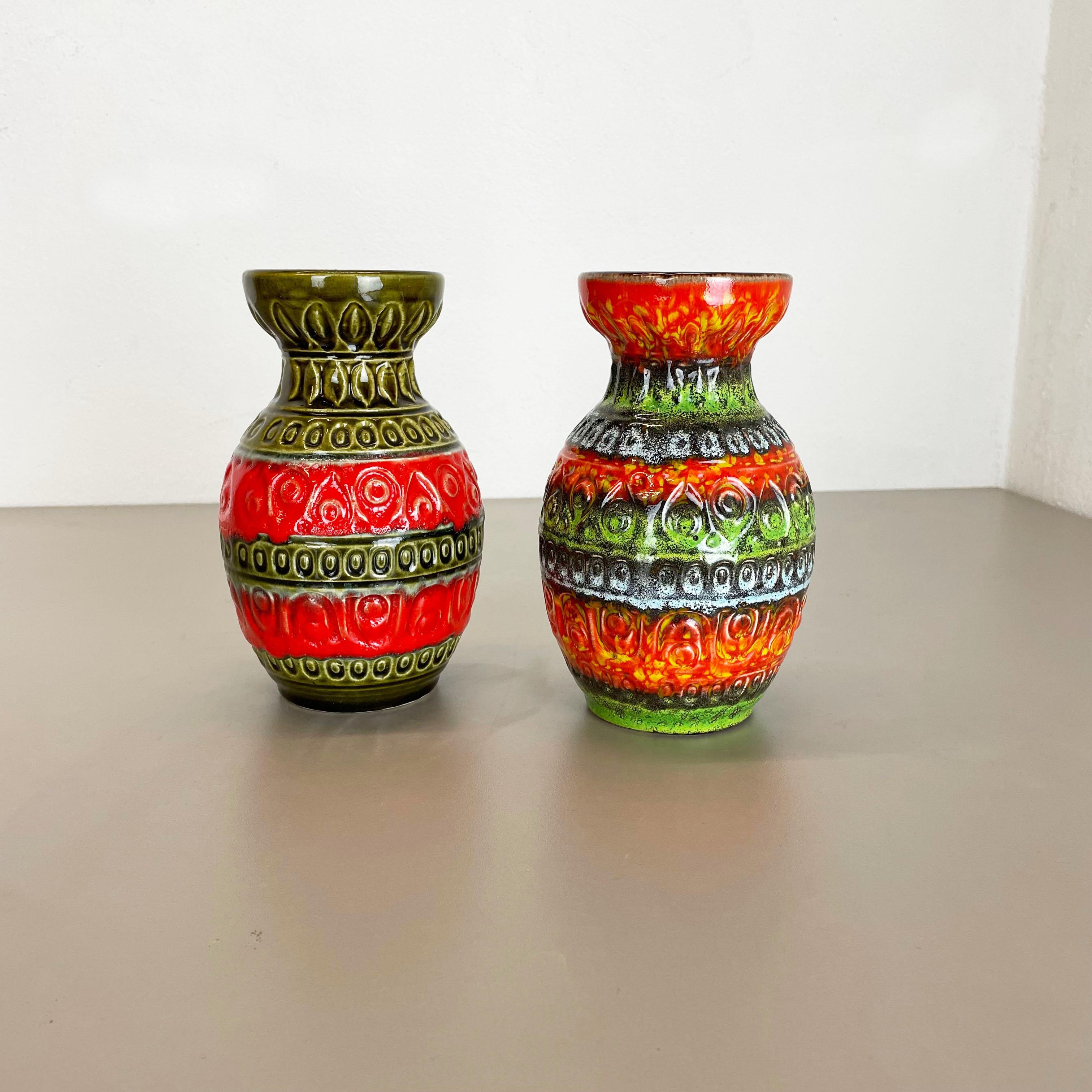 Article:

Pottery ceramic vase set of 2


Producer:

BAY Ceramic, Germany


Decade:

1970s



Description:

Set of 2 original vintage 1970s pottery ceramic vase made in Germany. High quality German production with a nice abstract