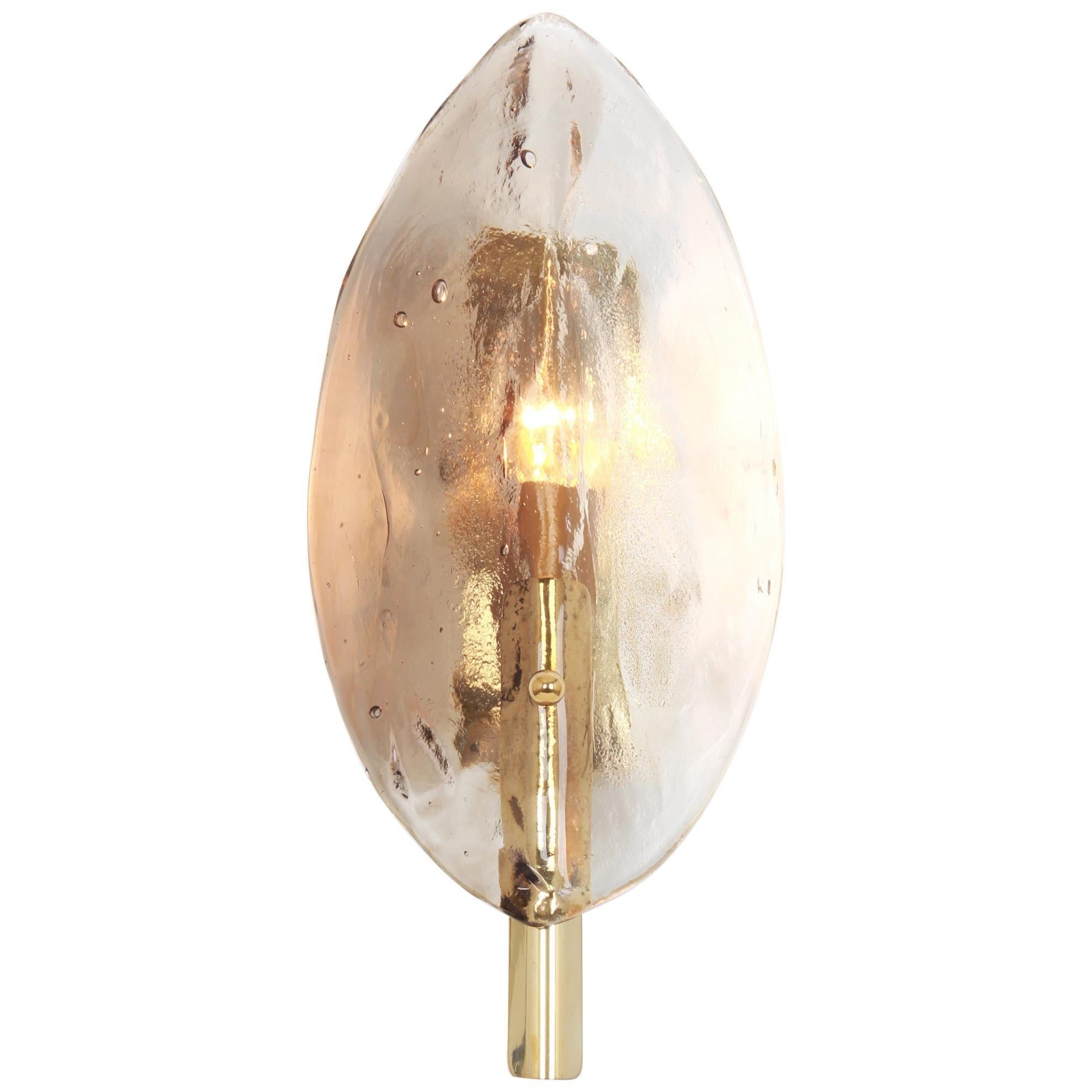 Wonderful Set of 2 midcentury wall sconces with handcrafted Smoked Murano glass pieces on a brass base, made by J. T. Kalmar, Austria, manufactured, circa 1970-1979.
High quality and in very good condition. Cleaned, well-wired, and ready to