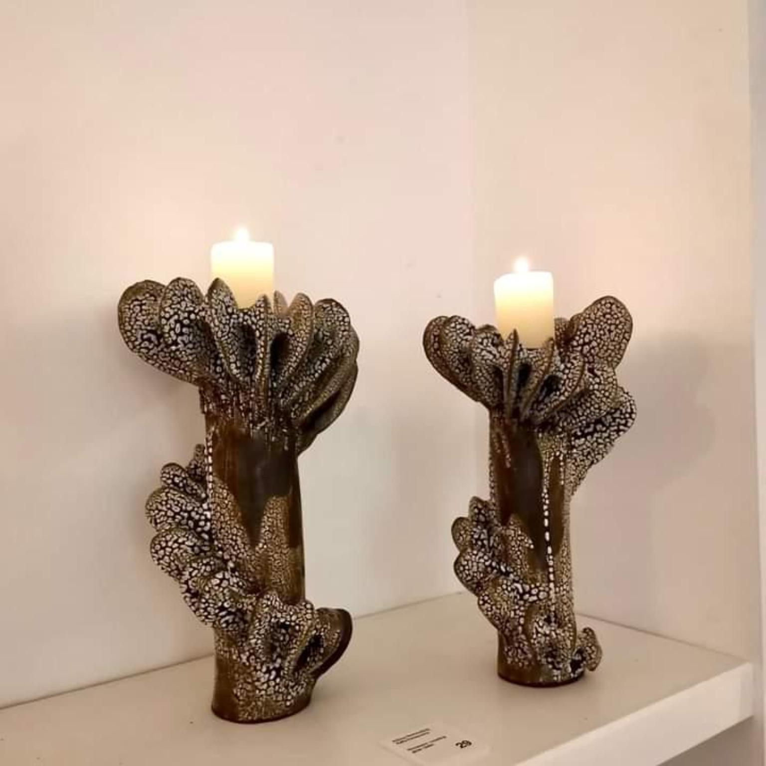 Set Of 2 Nautilus Candle Holders in Glazed Black Clay by Kallia Panopoulou
Dimensions: Ø 10 x H 30 cm. 
Materials: Clay.

Available in different finish options: Black clay crawl glazing, Mat white glazing on stoneware, or Deep blue glossy glazing