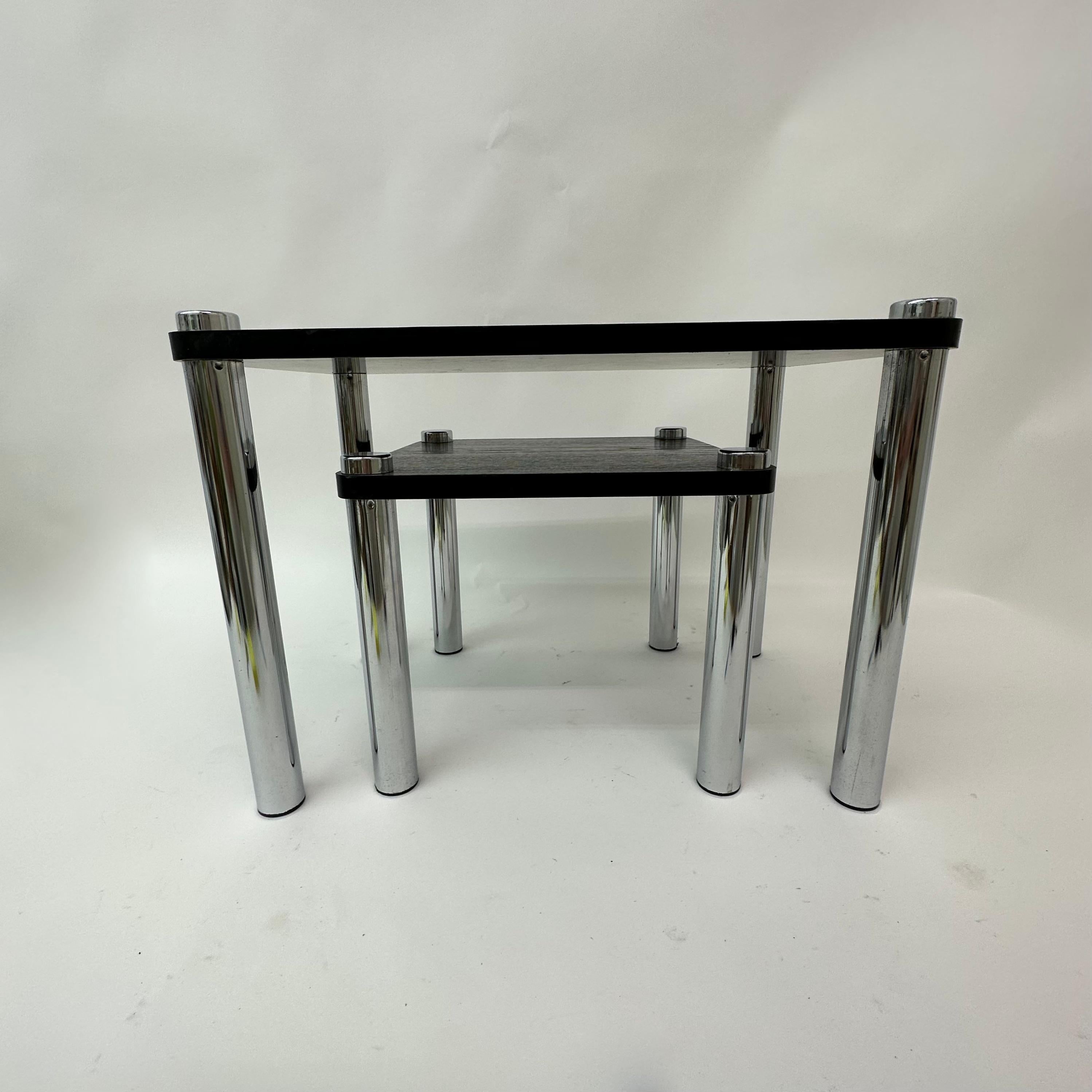 Set of 2 nesting tables , 1970’s
Dimensions: 54 cm W, 34cm D, 40 cm H and 34 cm W , 34cm D, 30 cm H
Period: 1970’s
Material: Wood veneer , metal
Condition: Good