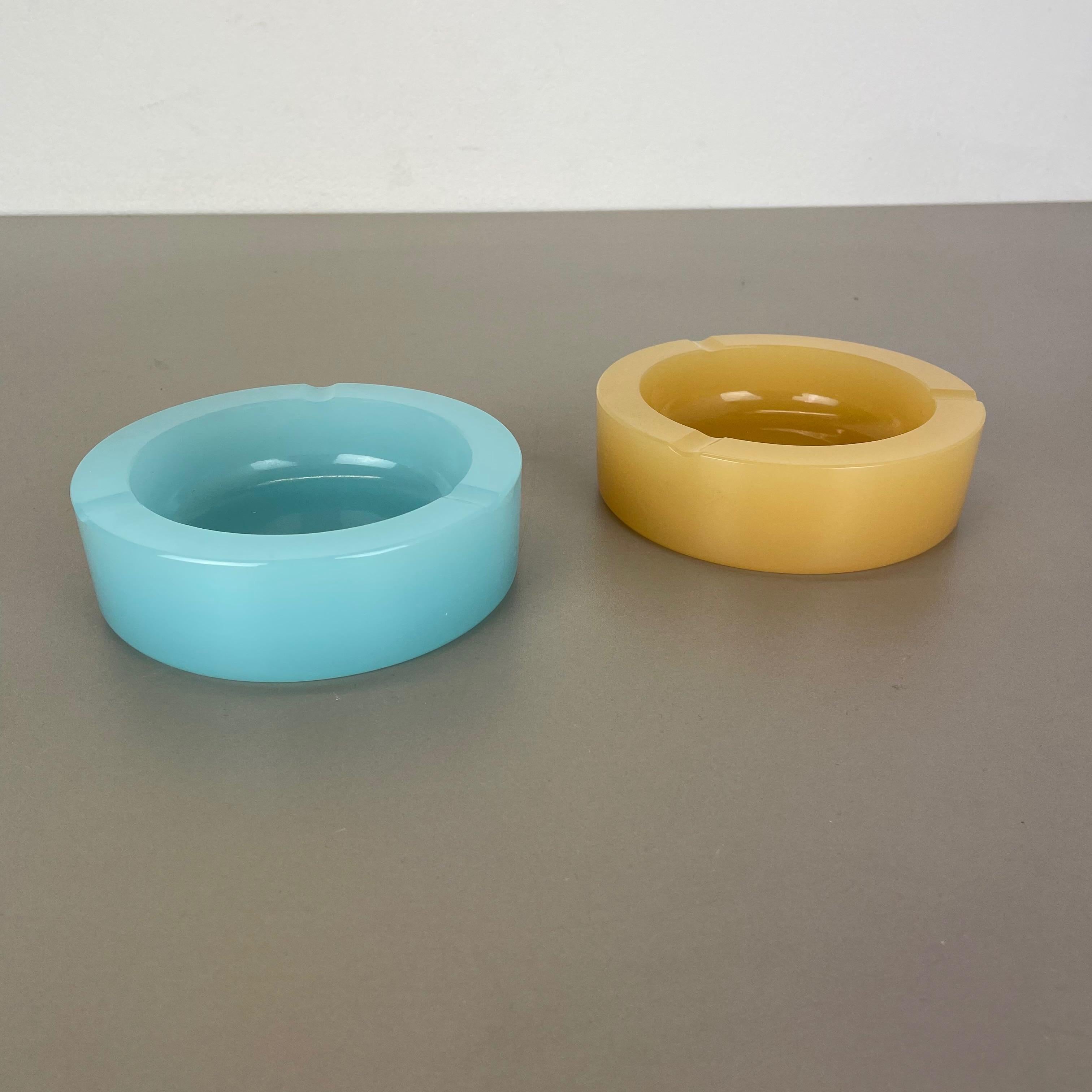 Article:

Murano opaline glass ashtrays set of 2


Design:

Gino Cenedese


Producer:

Cenedese Vetri (marked underneath the vase)


Origin:

Murano, Italy


Decade:

1960s-1970s


This original set of 2 ashtray elements