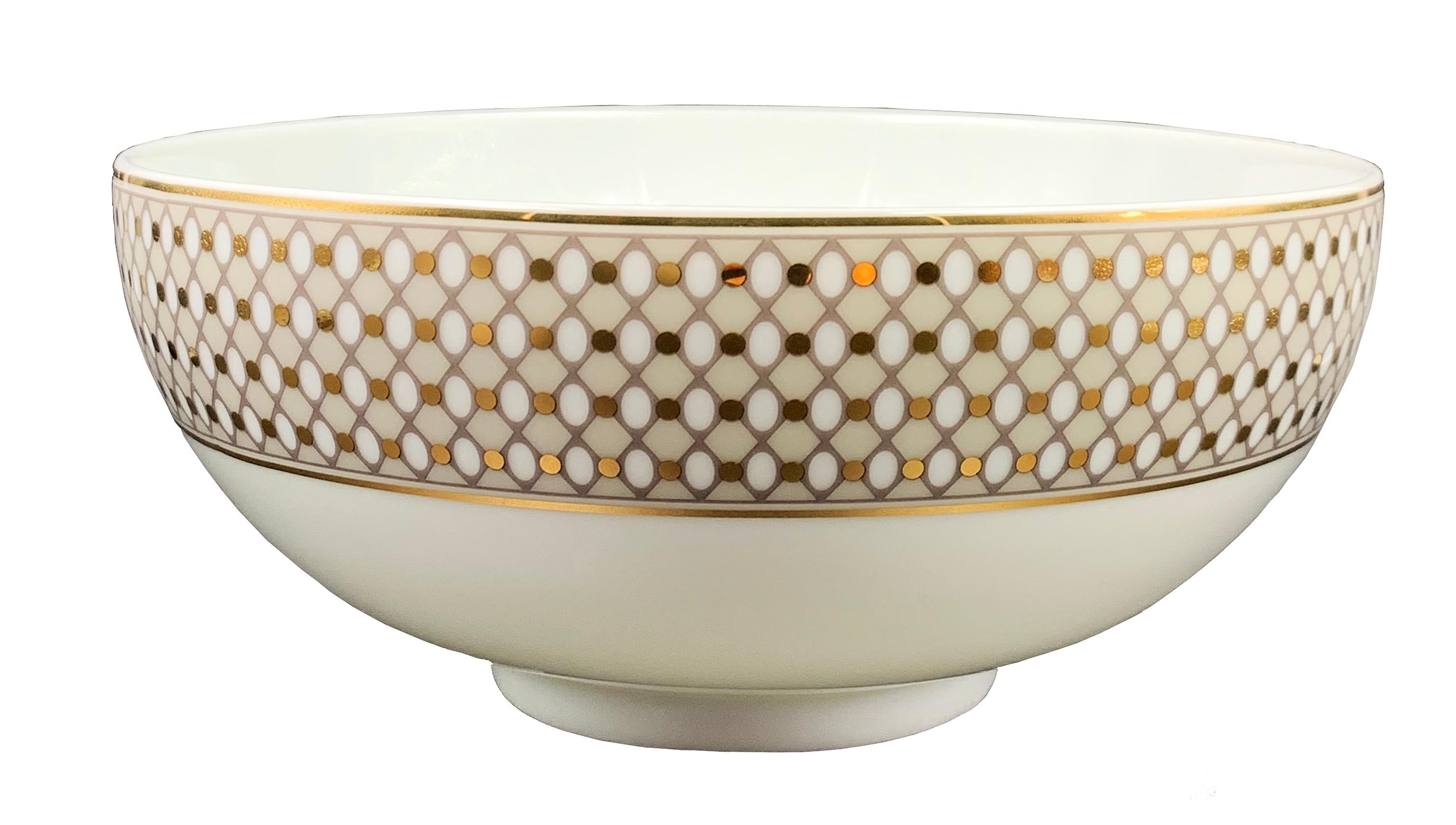 Larger quantities available upon request, with 8 weeks production time.

Description: Large noodle salad bowl (2 pieces)
Color: Beige and gold
Size: 20 Ø x 8.5 H cm, 1300ml
Material: Porcelain and gold
Collection: Modern Vintage.