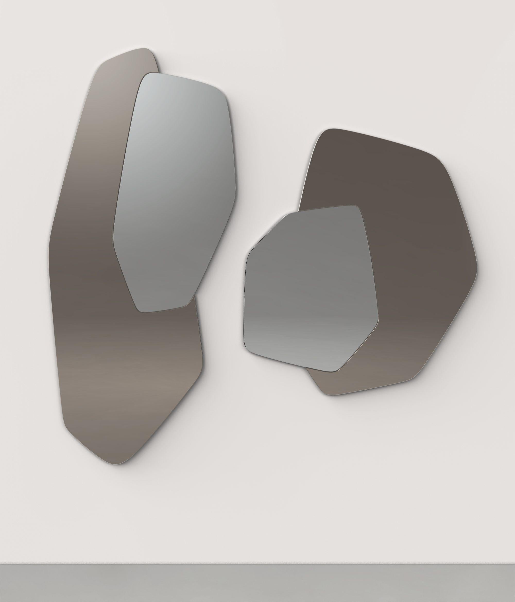 Set of 2 Nori V1 and V2 Wall Mirrors by Edizione Limitata
Limited Edition of 1000 pieces. Signed and numbered.
Dimensions: Nori V1: D 4 x W 56 x H 124 cm.
Nori V2: D 4 x W 70 x H 80 cm.
Materials: Bronzed and silvered mirror.

Nori is a collection