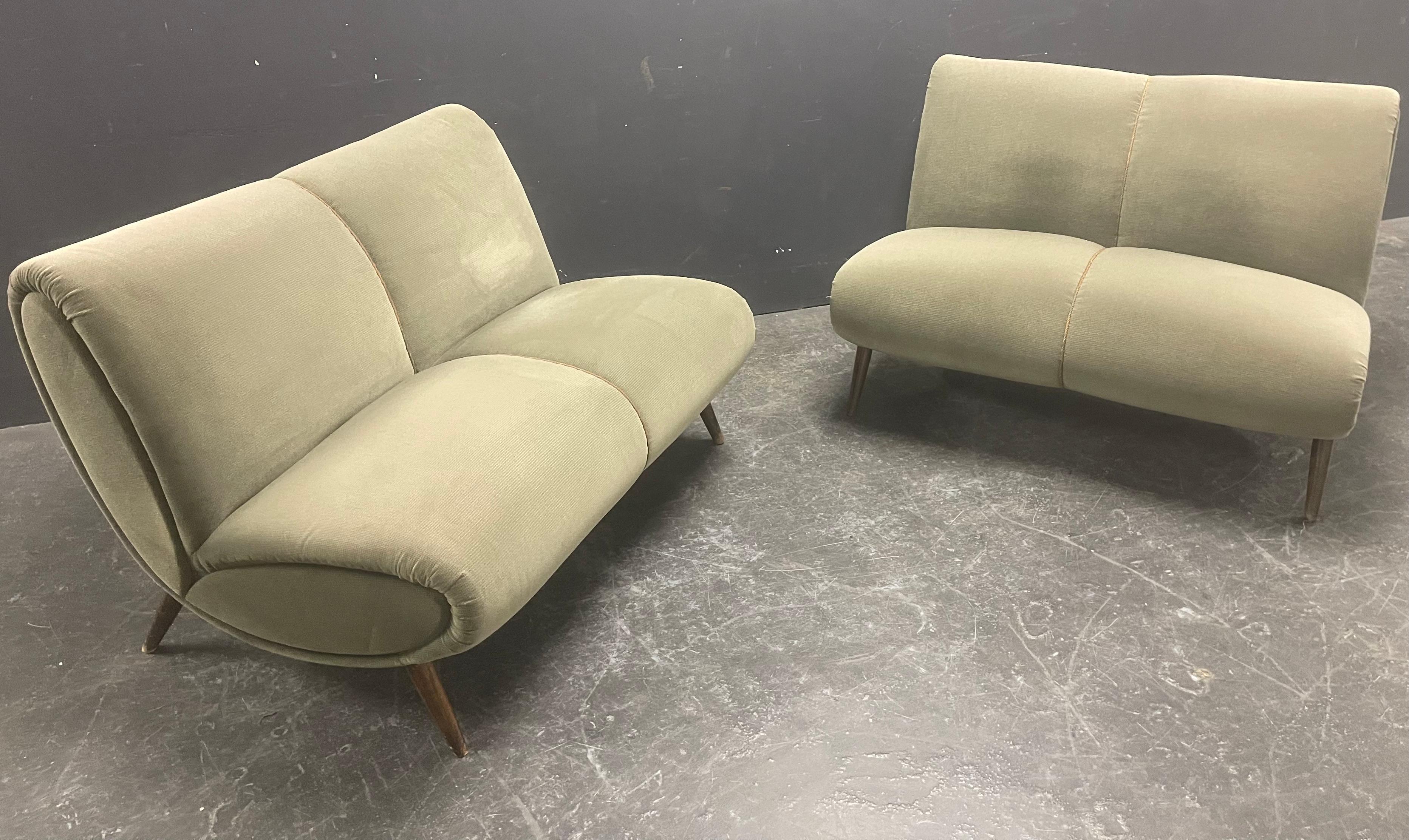 rare set of two small 2-seater sofas by norman bel geddes. corner element also available.