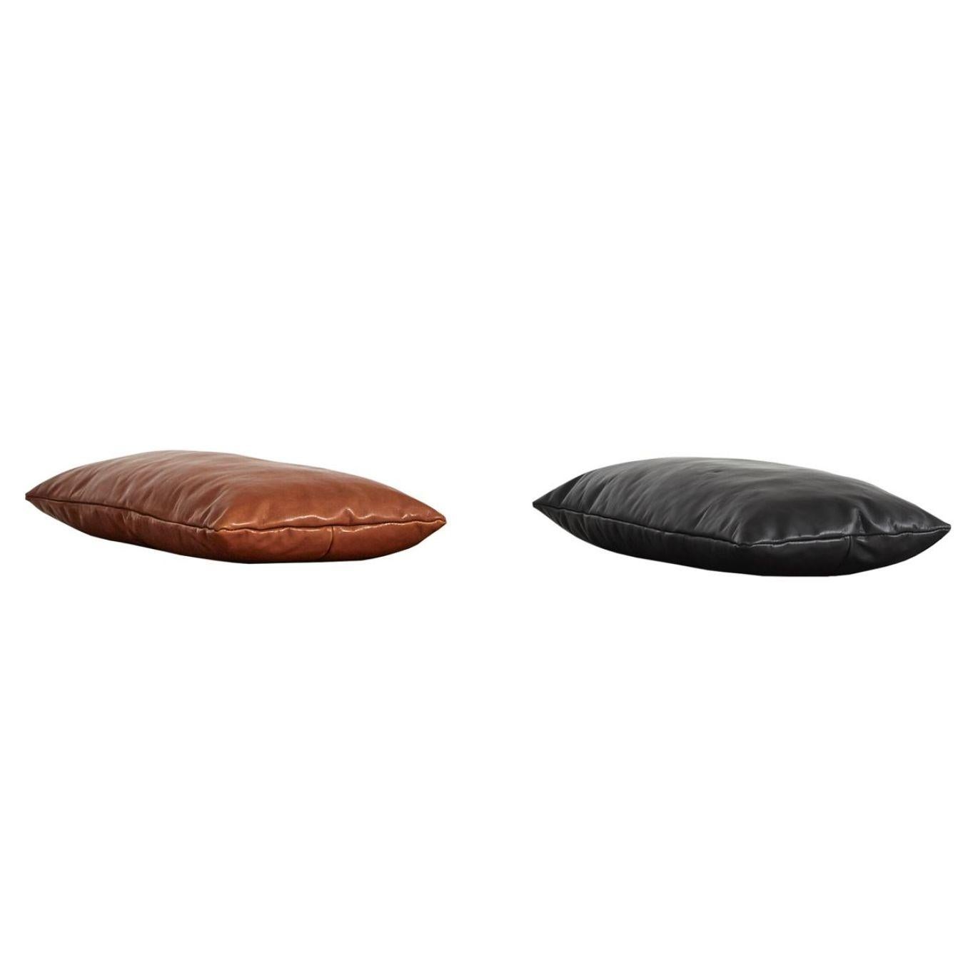 Set of 2 nought / black level pillows by Msds Studio.
Materials: Camo Leather.
Dimensions: D 23.5 x W 67 x H 8.5 cm.

The founders, Mia and Torben Koed, decided to put their 30 years of experience into a new project. It was time for a change and
