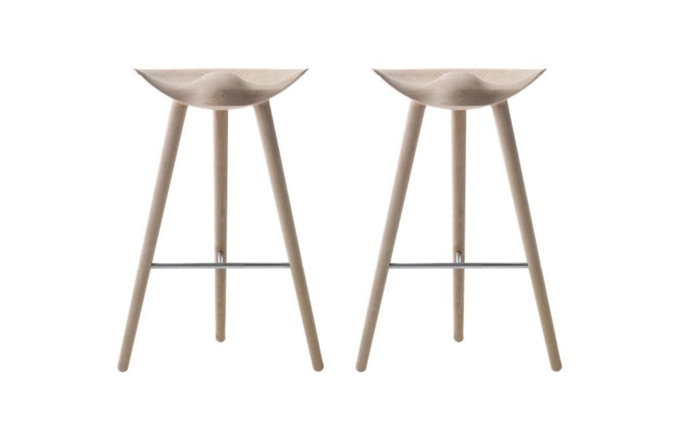 Set Of 2 Oak and Stainless Steel Bar Stools by Lassen
Dimensions: H 77 x W 36 x L 55.5 cm
Materials: Oak, Stainless Steel

In 1942 Mogens Lassen designed the Stool ML42 as a piece for a furniture exhibition held at the Danish Museum of