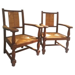 ensemble de 2 fauteuils en Oak et assise en paille circa 1940
