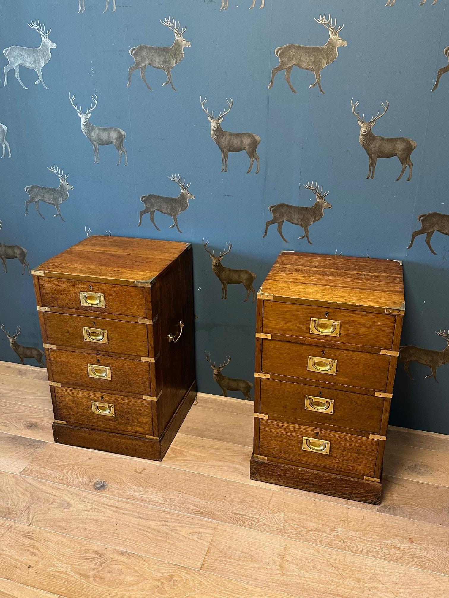 Set of two antique oak bedside tables in military style. Beautiful warm color and sleek appearance.
Origin: England
Period: circa 1930
Dimensions: 43cm x 43cm x h.73cm