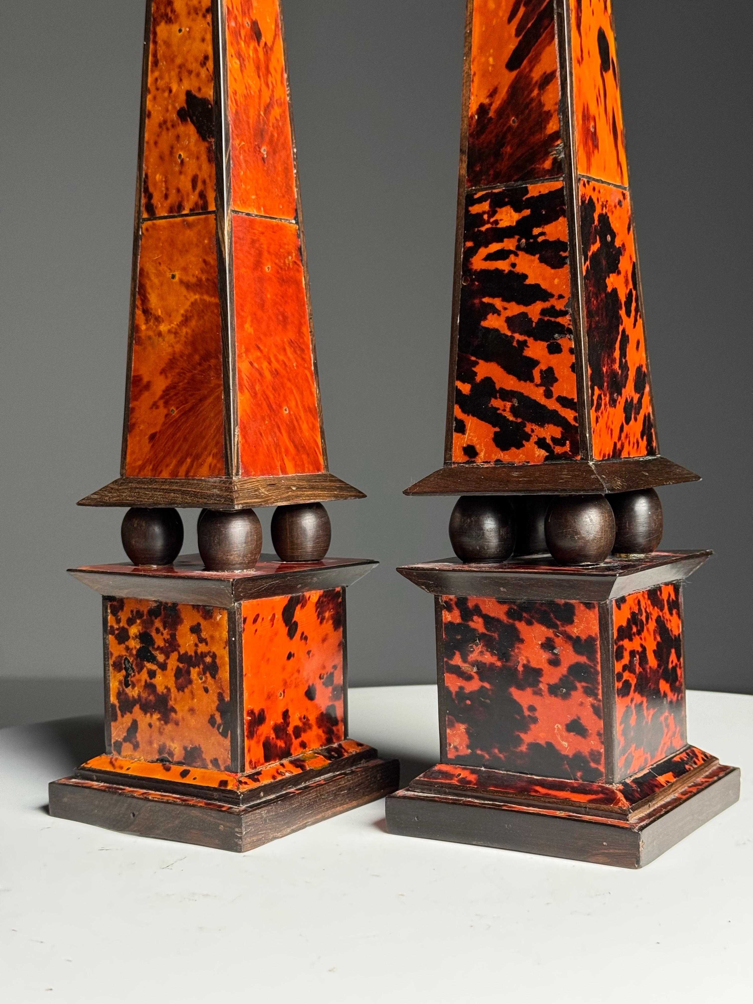 Set of 2 Tortoise and Ebony obelisks.
From France, 1920-1940.
In very good condition.

Dimensions: 44H x 10.5W x 10.5D cm