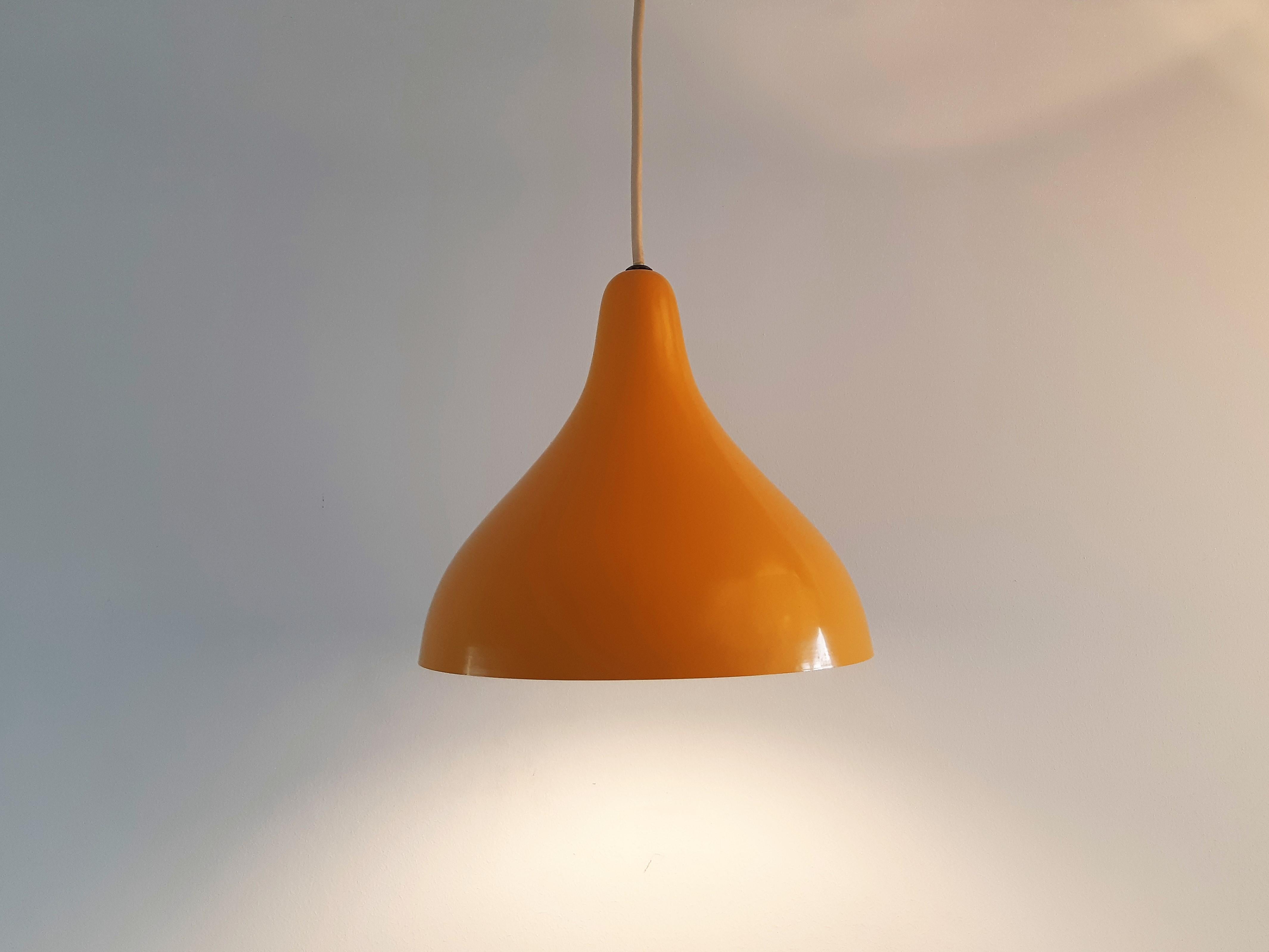 This lamp is reminiscent of the work of Lisa Johansson-Pape for lighting company Orno. It is a beautiful organic design from the early 50's, with exactly the same details of Pape's work, also with how the sockets are attached to the fixtures.