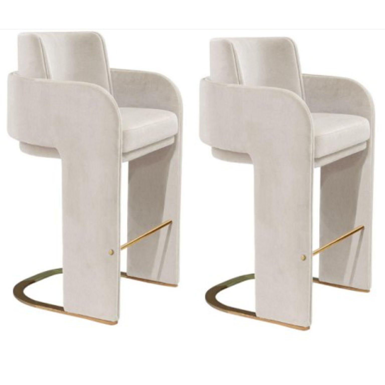 Set of 2 Odisseia bar chairs by DOOQ
Dimensions
W 56 x D 57 x H 105.5 x Seat H 75 cm

Materials and finishes
Base and feet in stainless steel plated polished or satin: brass, copper or nickel. Upholstery: seat, armrests and back fully