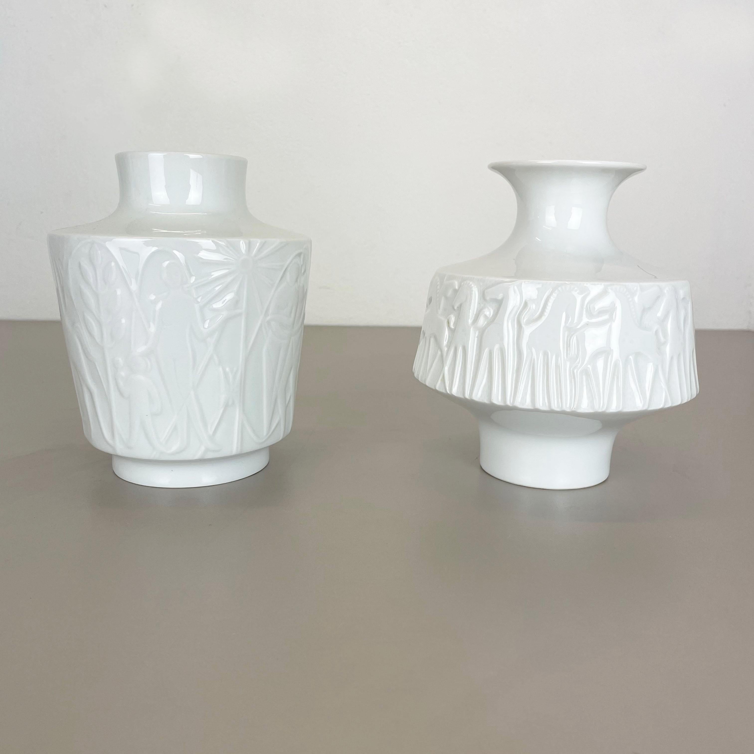 Article:

Op Art porcelain vases set of 2


Producer:

Edelstein Bavaria, Germany

Age:

1970s


This original vintage OP Art Vase set was produced in the 1970s in Germany. It is made of porcelain with an OP Art elliptical surface