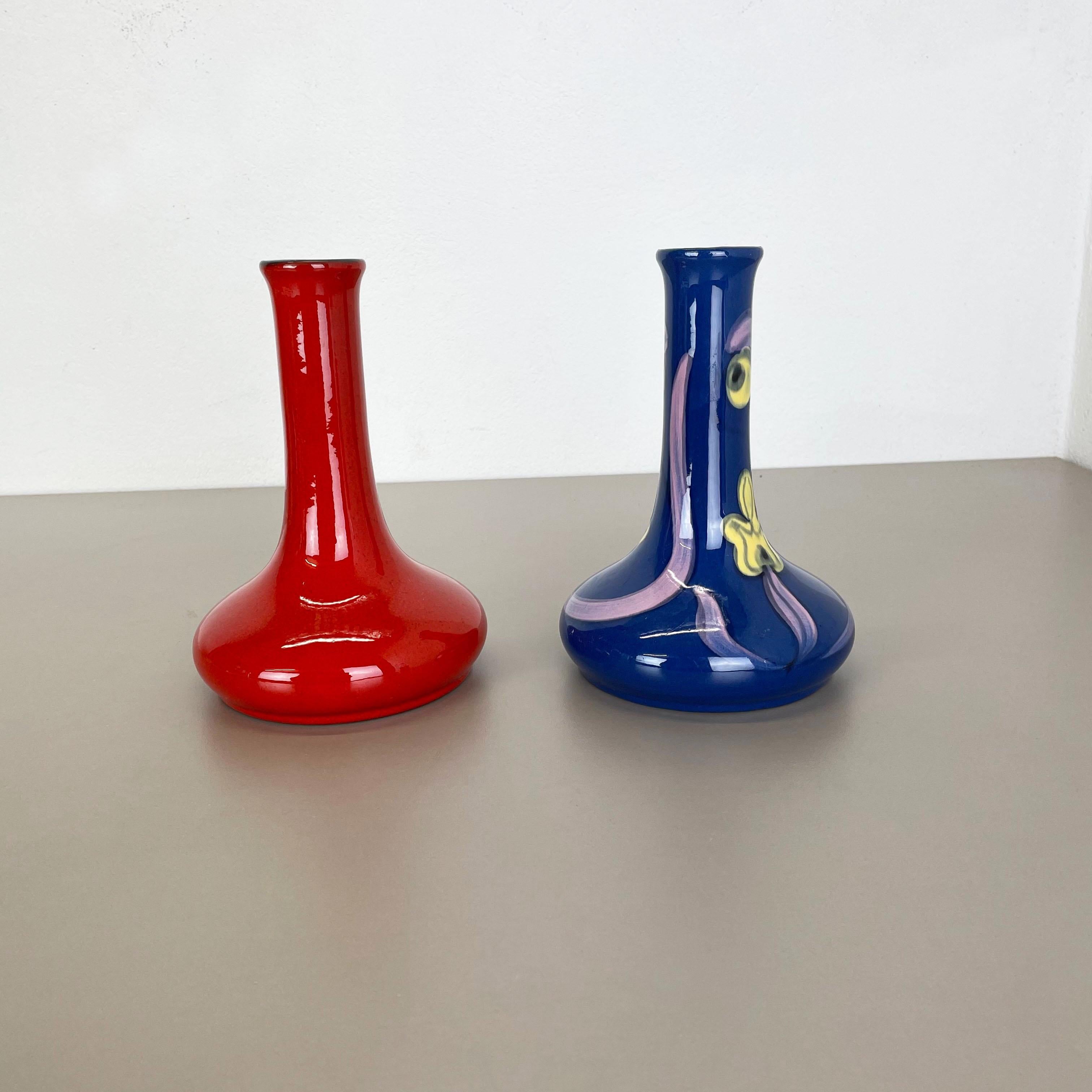 Article:

Ceramic fat lava vases set of 2


Producer:

Marei Ceramics, Germany


Decade:

1970s





Set of 2 original vintage Studio Pottery vases was produced in the 1970s by Marei Ceramics, Germany. Rare set of 2 identical vases