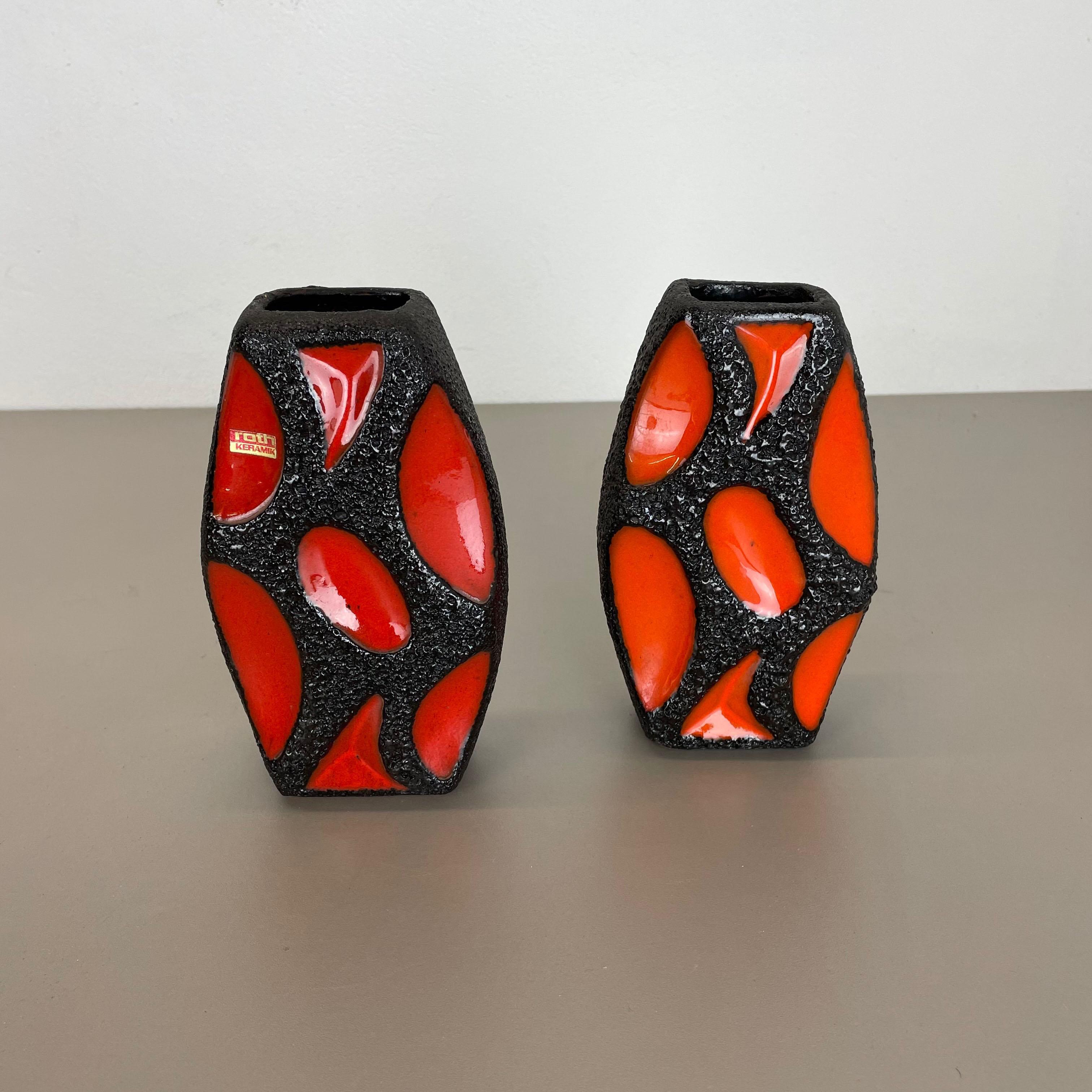 Article:

Ceramic fat lava vases set of 2


Producer:

Roth Ceramics, Germany


Decade:

1970s





Set of 2 original vintage Studio Pottery vases was produced in the 1970s by Roth Ceramics, Germany. Rare set of 2 vases with in