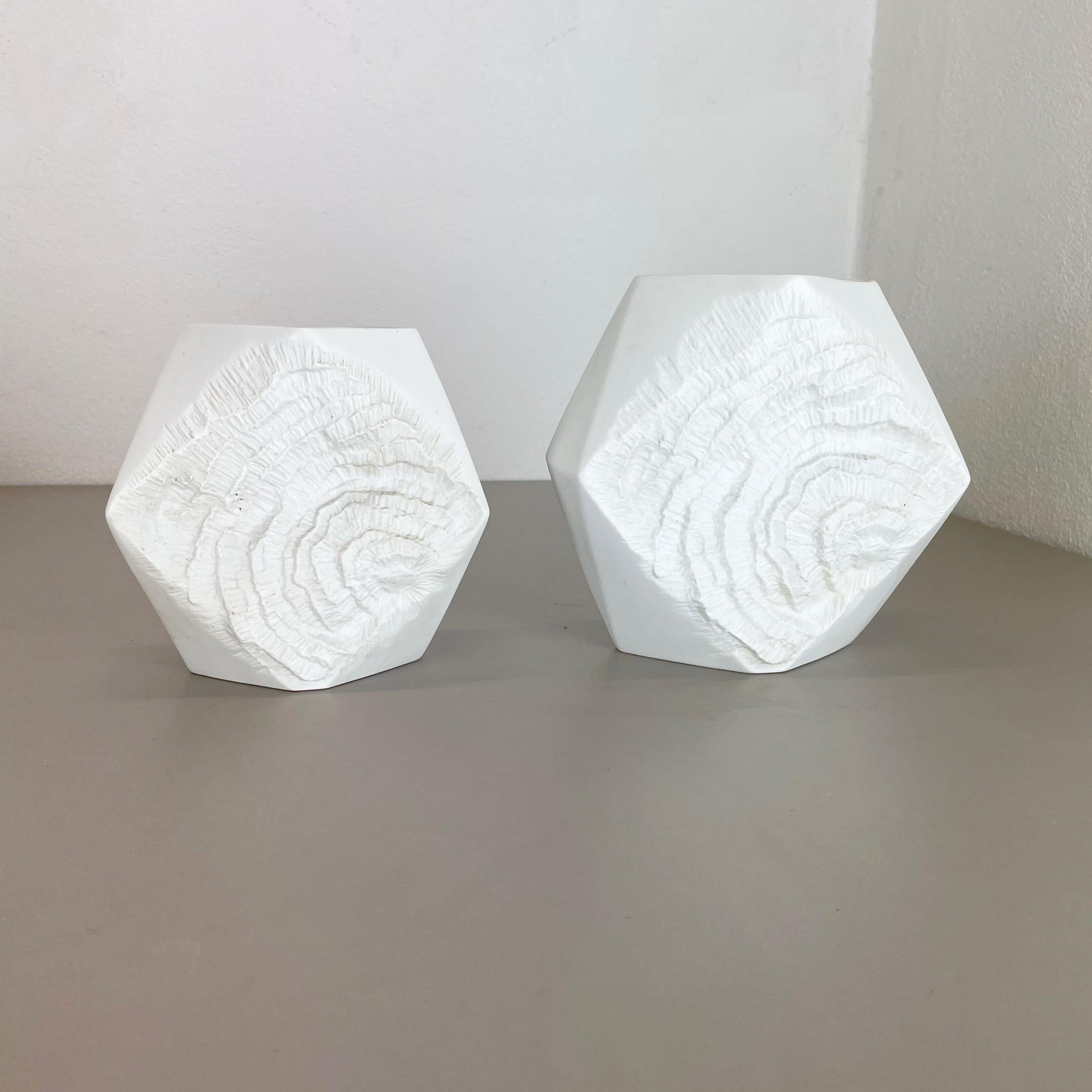 Article:

Op Art porcelain vase set of 2


Producer:

AK Kaiser, Germany


Description:

This original vintage OP Art Vase was produced in the 1970s in Germany. it is made of porcelain with an OP Art rock surface optic. the bottom is