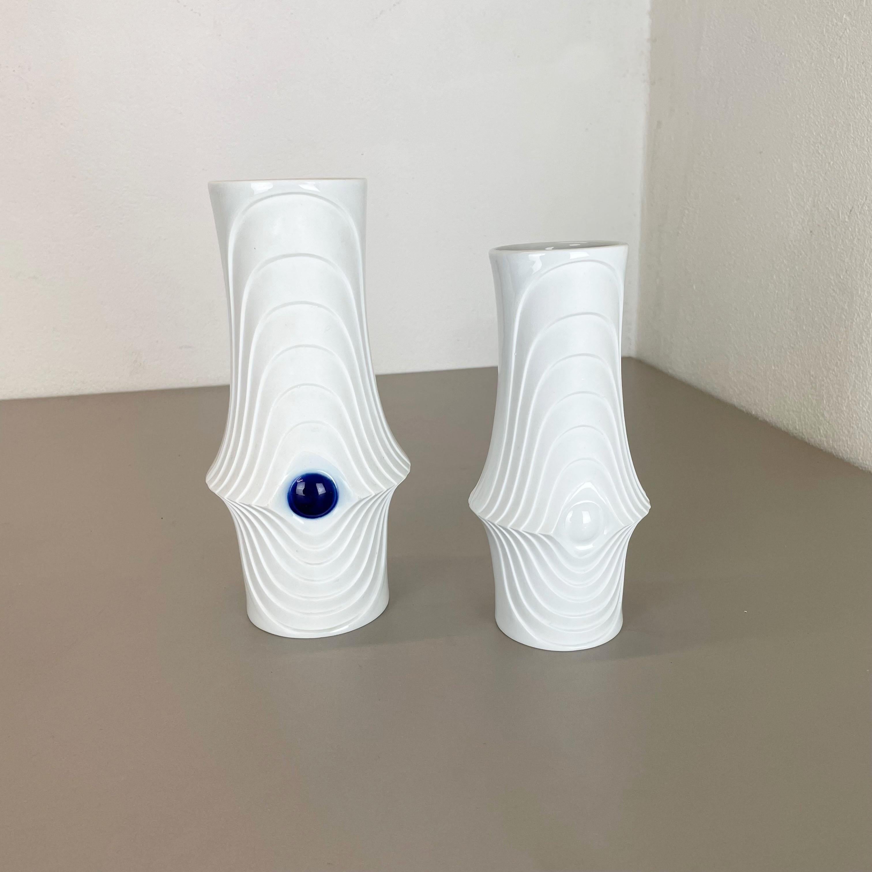 Article:

OP Art porcelain vase set


Producer:

Royal Bavaria KPM Germany


 

This original vintage OP Art vase set was produced in the 1970s in Germany. It is made of porcelain with an OP Art abstract formed surface.
The bottom is