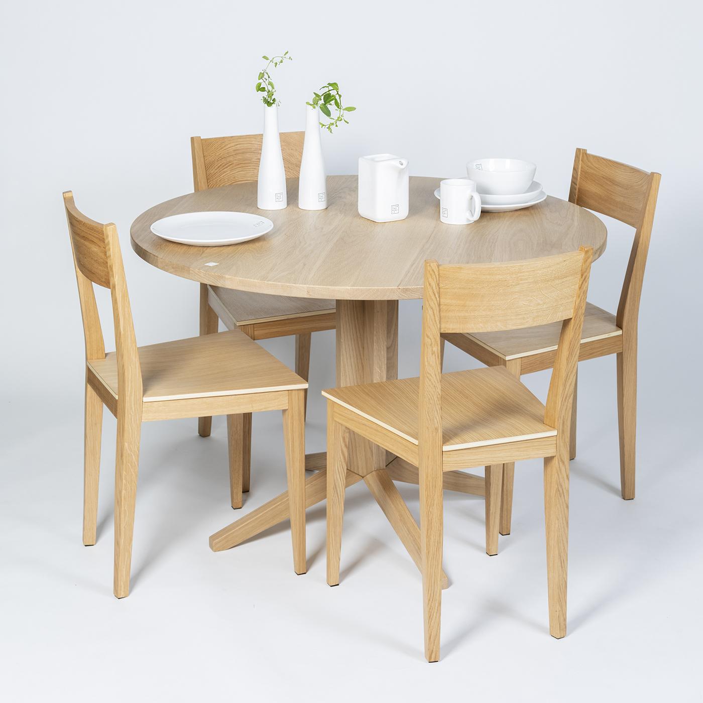 Clean, simple and elegant lines are what make this set of two chairs impossible not to love. The chairs come in solid oak that has been coated in an oil finish and they are perfect for any modern dining or living space. The slightly curved backrest