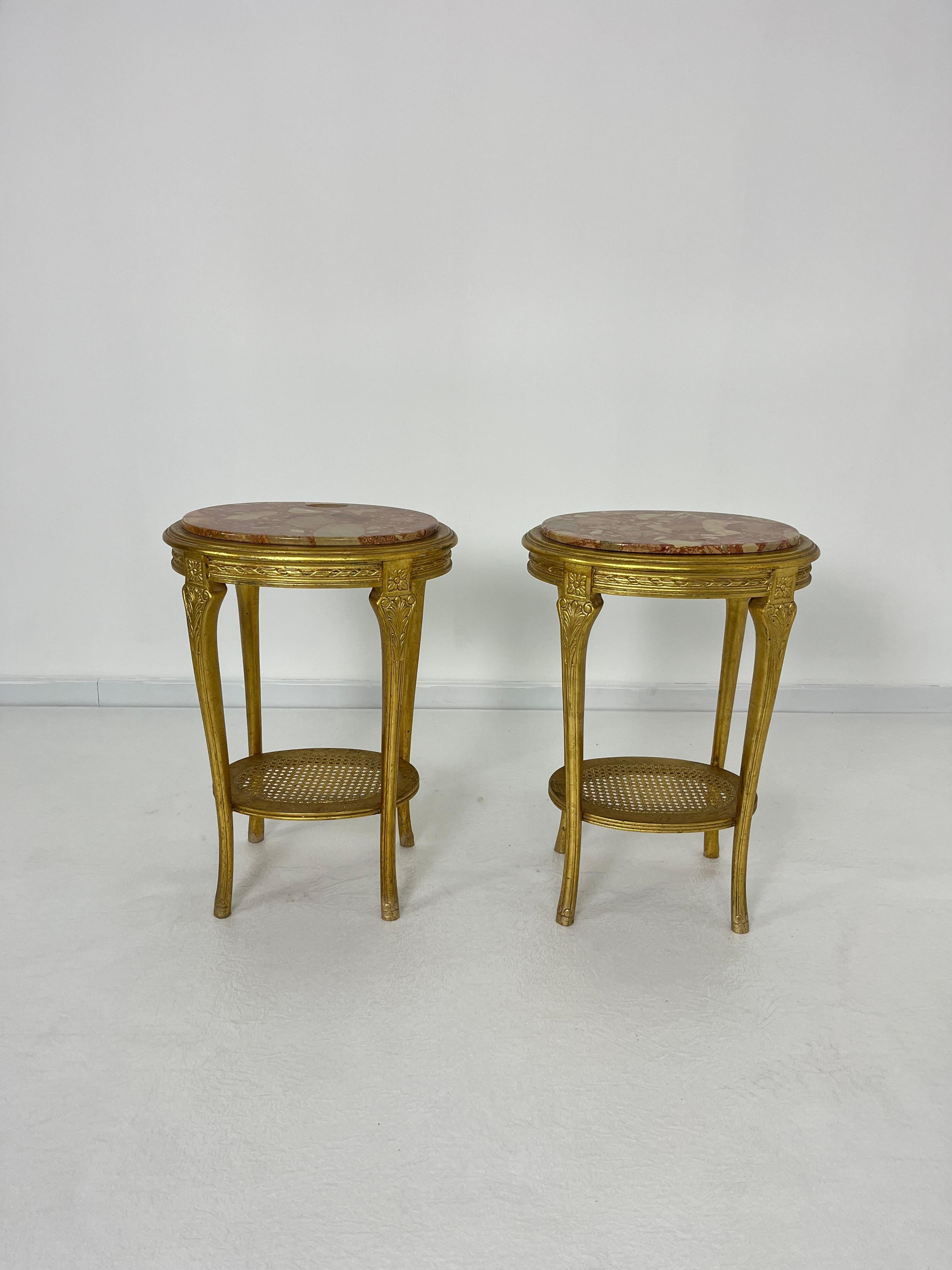 Set of 2 oval Italian Mid-century nightstands, 1960s.
Gilded wood, rattan and marble.
intact and in good condition.