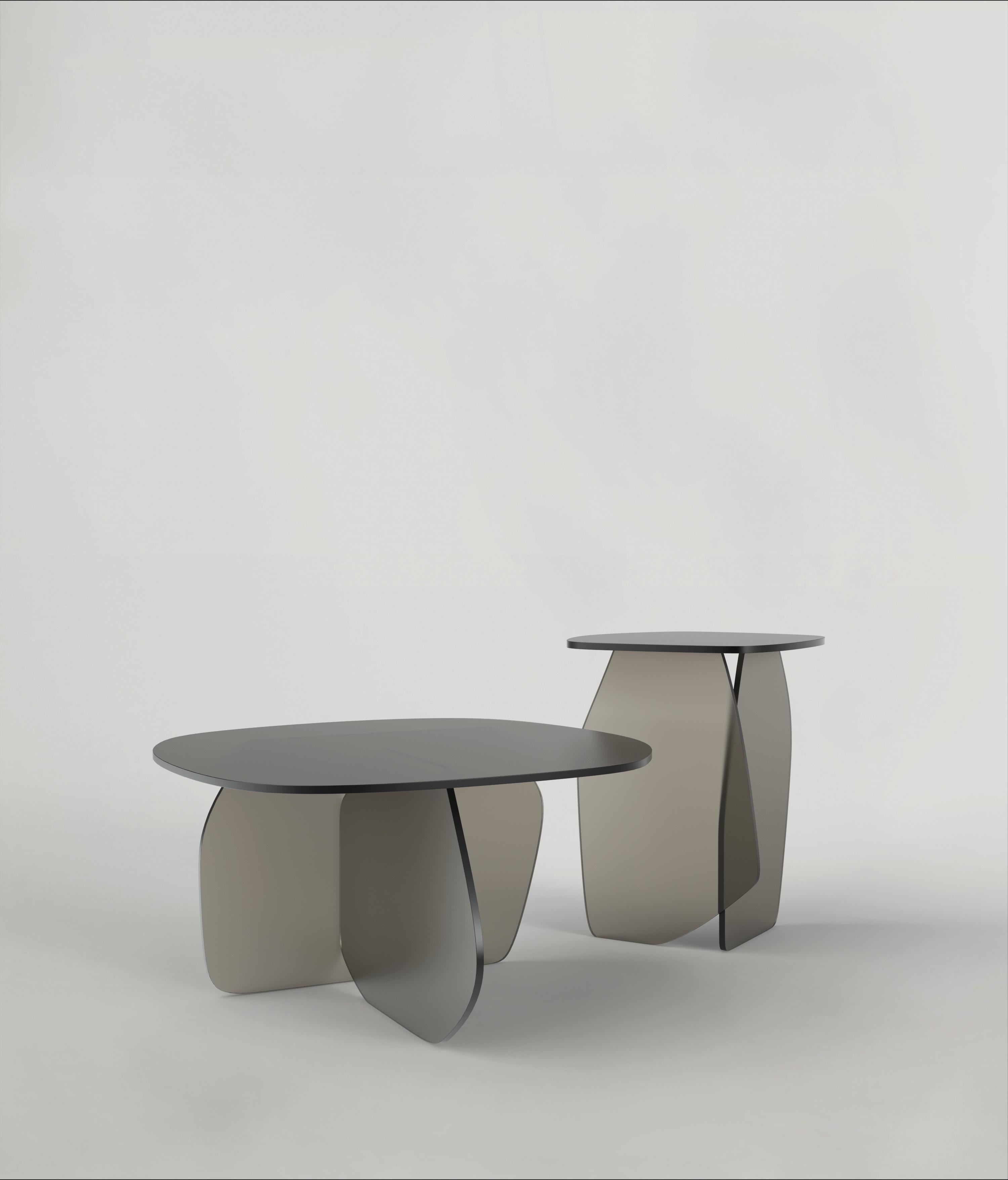 Set of 2 Panorama V1 and V2 Tables by Edizione Limitata
Limited Edition of 1000 pieces. Signed and numbered.
Dimensions: D33 x W59 x H44 //D60x W59 x H33 cm 
Materials: Grey Satin Glass

Panorama V1 and V2 are respectively contemporary side and low
