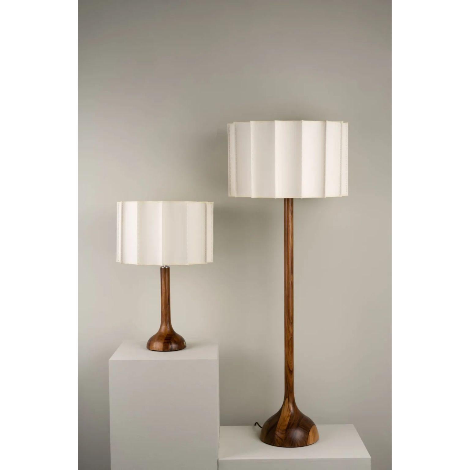 Set of 2 Pata De Elefante Lamps by Isabel Moncada
Dimensions: Floor Lamp: Ø 55 x H 150 cm.
Small Table Lamp: Ø 40 x H 70 cm.
Materials: Turned parota wood base and fabric-lined lampshade with fiberglass and polystyrene.

Named Pata de Elefante