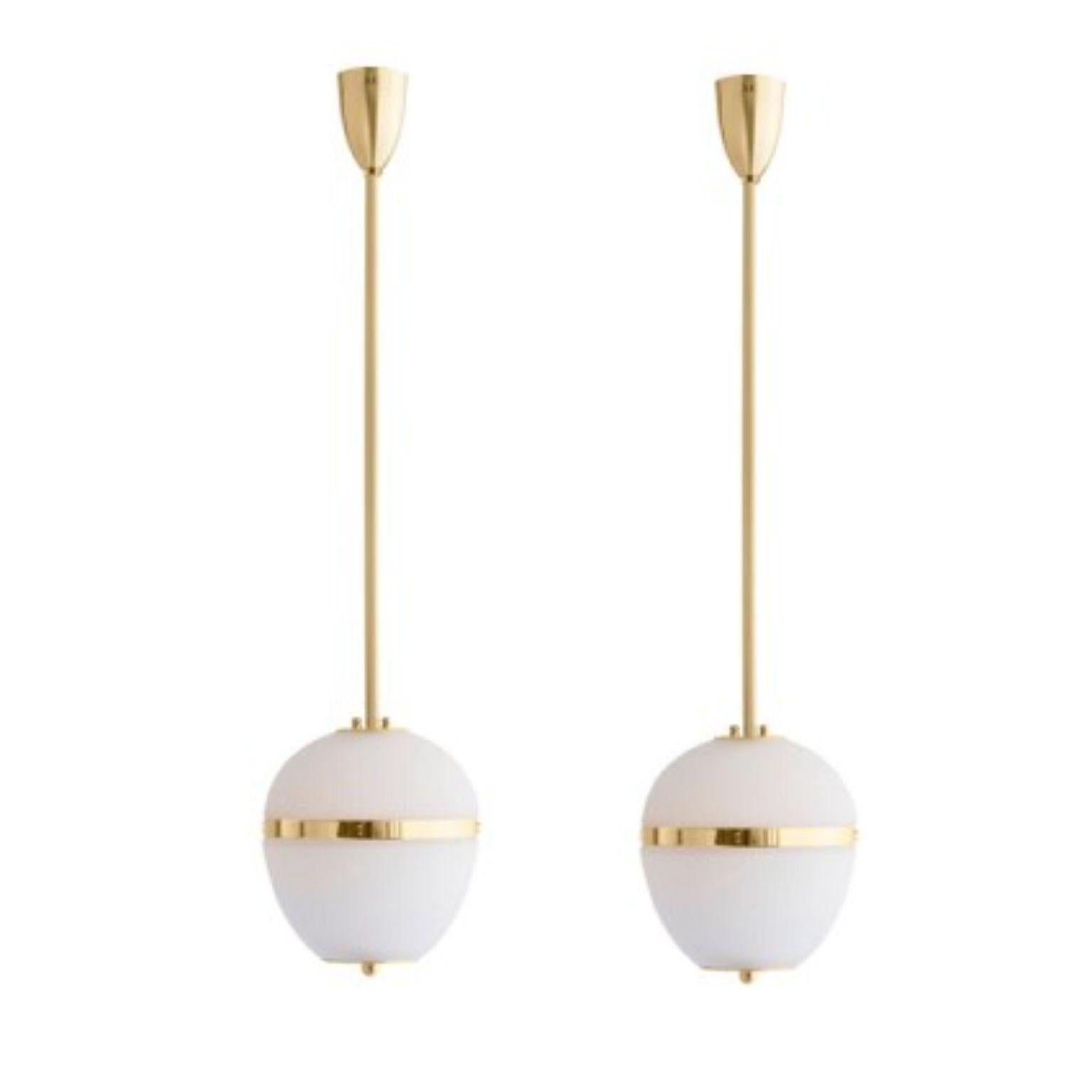 Pendant China 02 by Magic Circus Editions
Dimensions: H 90 x W 32 x D 32 cm, also available in H 110, 130, 150, 175, 190 cm
Materials: Brass, mouth blown glass sculpted with a diamond saw
Colour: enamel soft white

Available finishes: Brass,