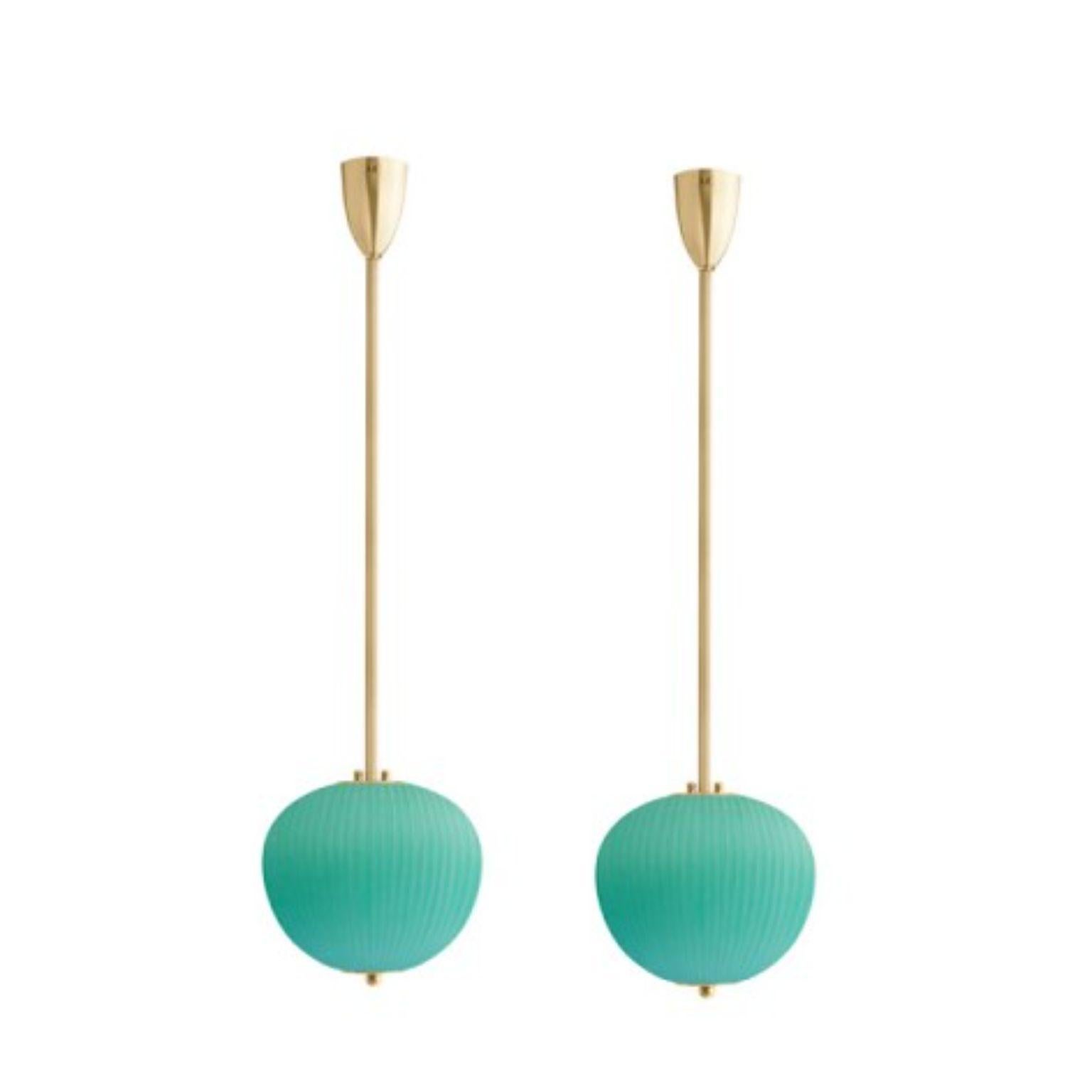 Pendant China 03 by Magic Circus Editions.
Dimensions: H 90 x W 26.2 x D 26.2 cm, also available in H 110, 130, 150, 175, 190.
Materials: brass, mouth blown glass sculpted with a diamond saw.
Colour: jade green.

Available finishes: brass,
