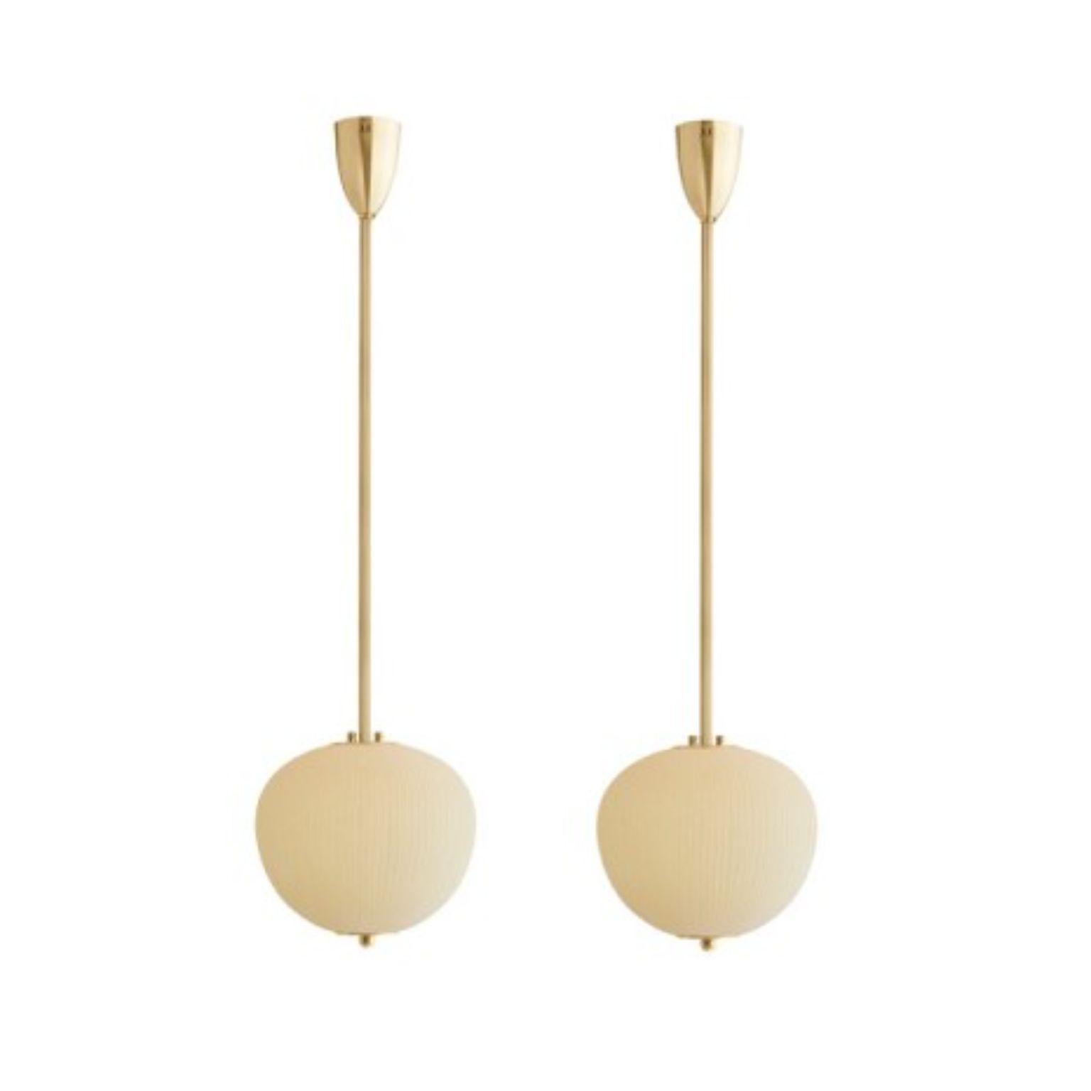 Pendant China 03 by Magic Circus Editions.
Dimensions: H 90 x W 26.2 x D 26.2 cm, also available in H 110, 130, 150, 175, 190.
Materials: brass, mouth blown glass sculpted with a diamond saw.
Colour: Mustard yellow.

Available finishes: brass,